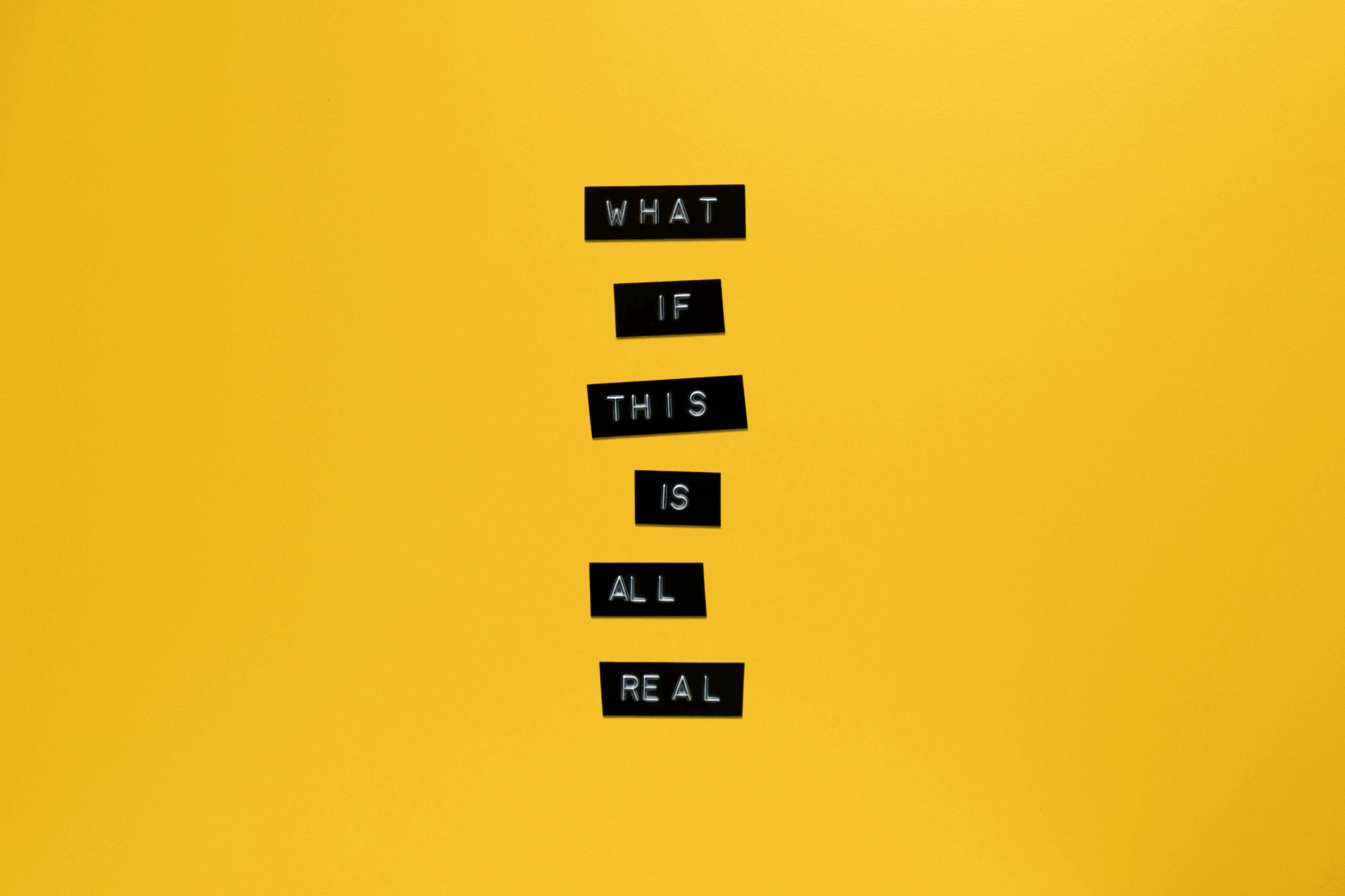 Motivational message displayed on a bright yellow background