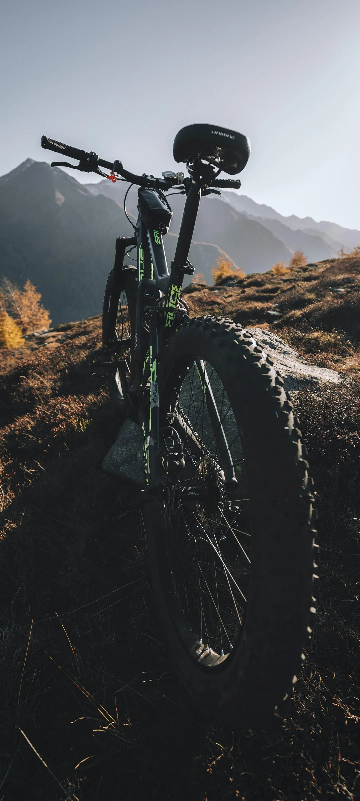 Mountain Bike Standing Alone on Rocky Trail Wallpaper