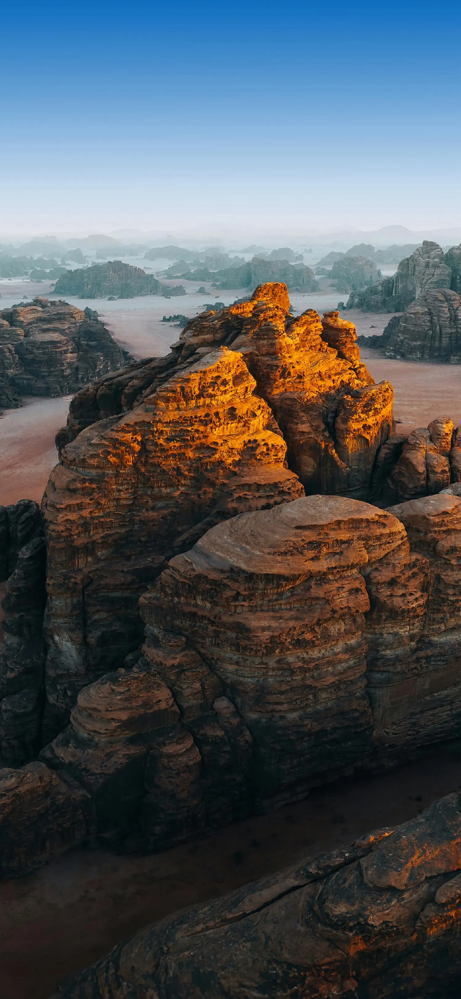 Mountain Valley at Sunrise with Red and Orange Rocks