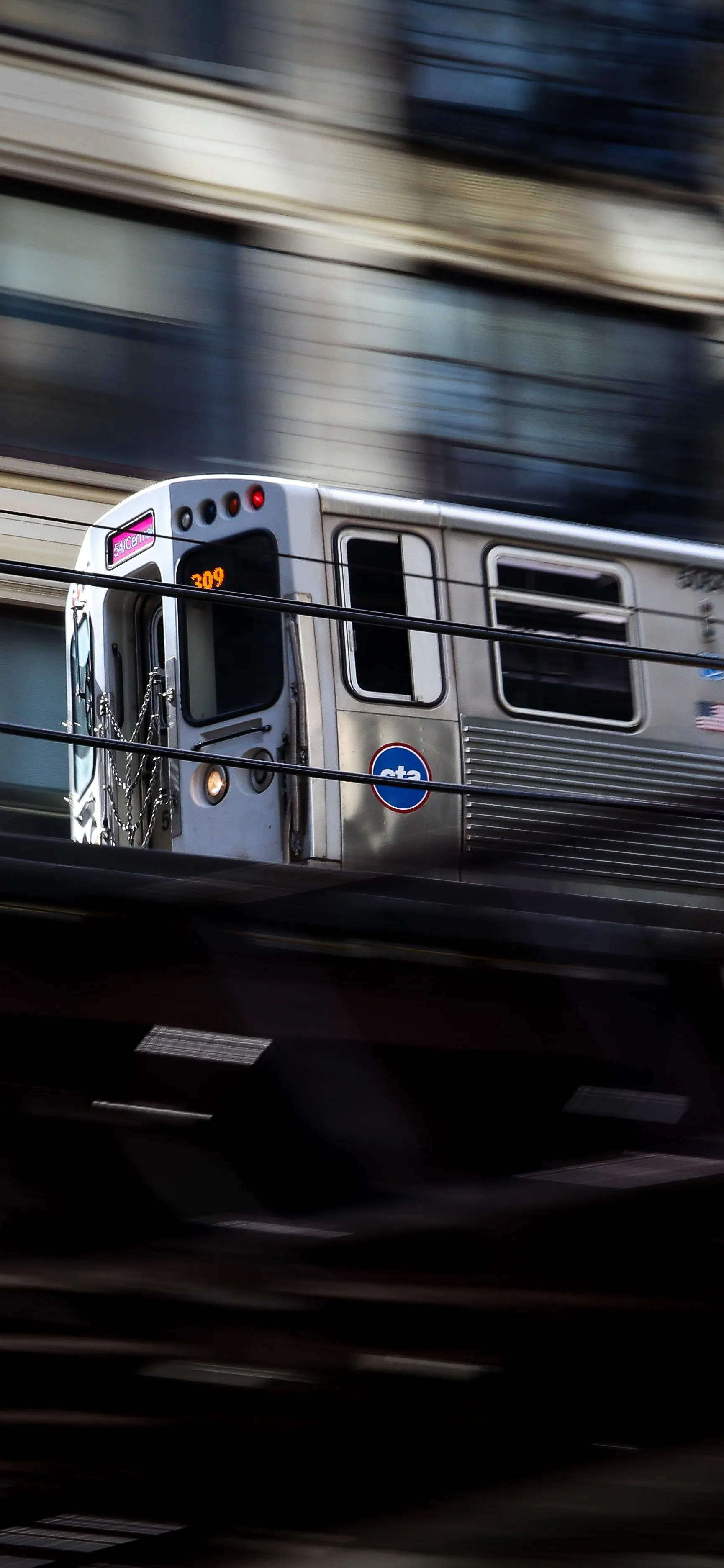 Moving Subway Train Passing Through Dark City Tunnel
