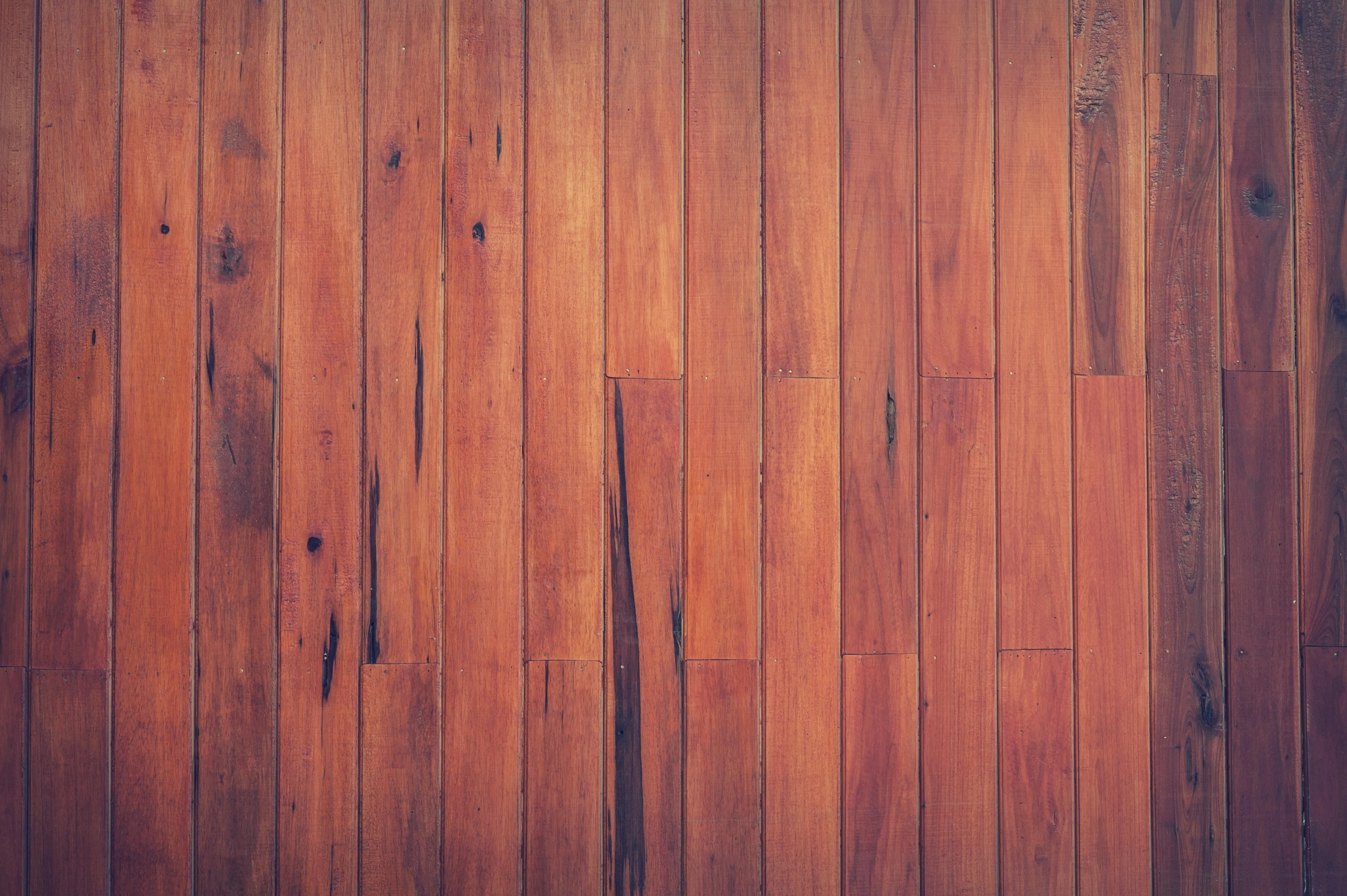 Natural wood flooring texture with warm rich brown planks