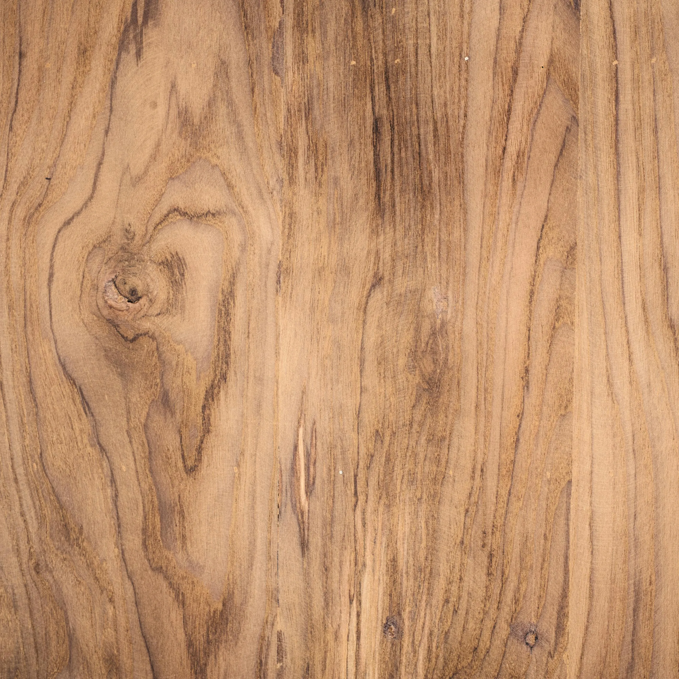 Natural wooden surface with warm grain and texture details