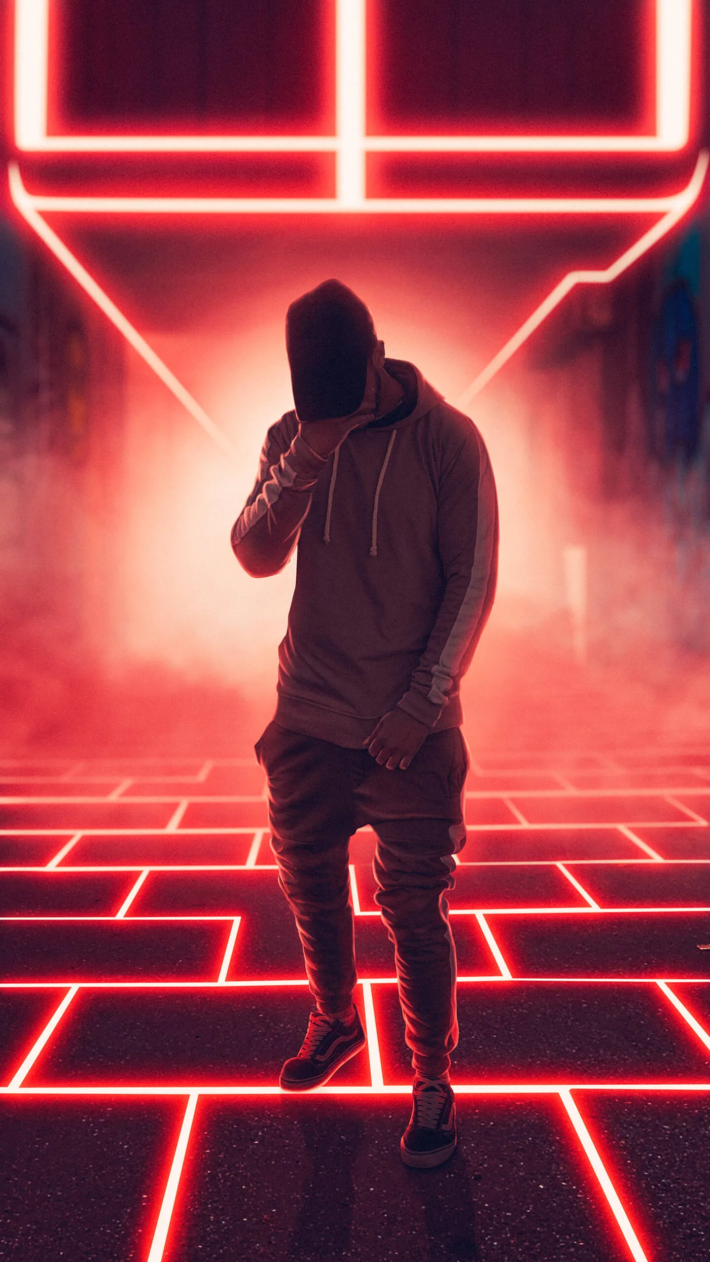 Neon Silhouette of Man in Cyberpunk Cityscape Wallpaper