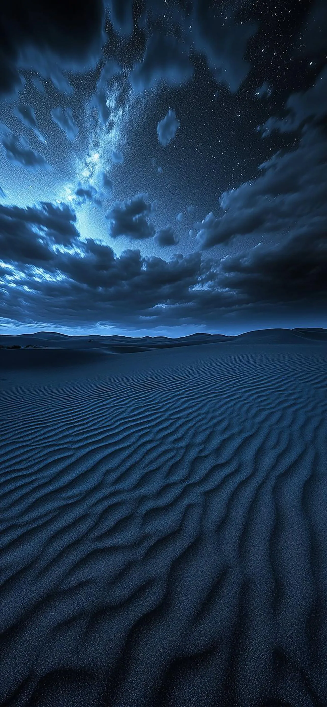Night Desert Scene with Sand Dunes and Dramatic Clouds