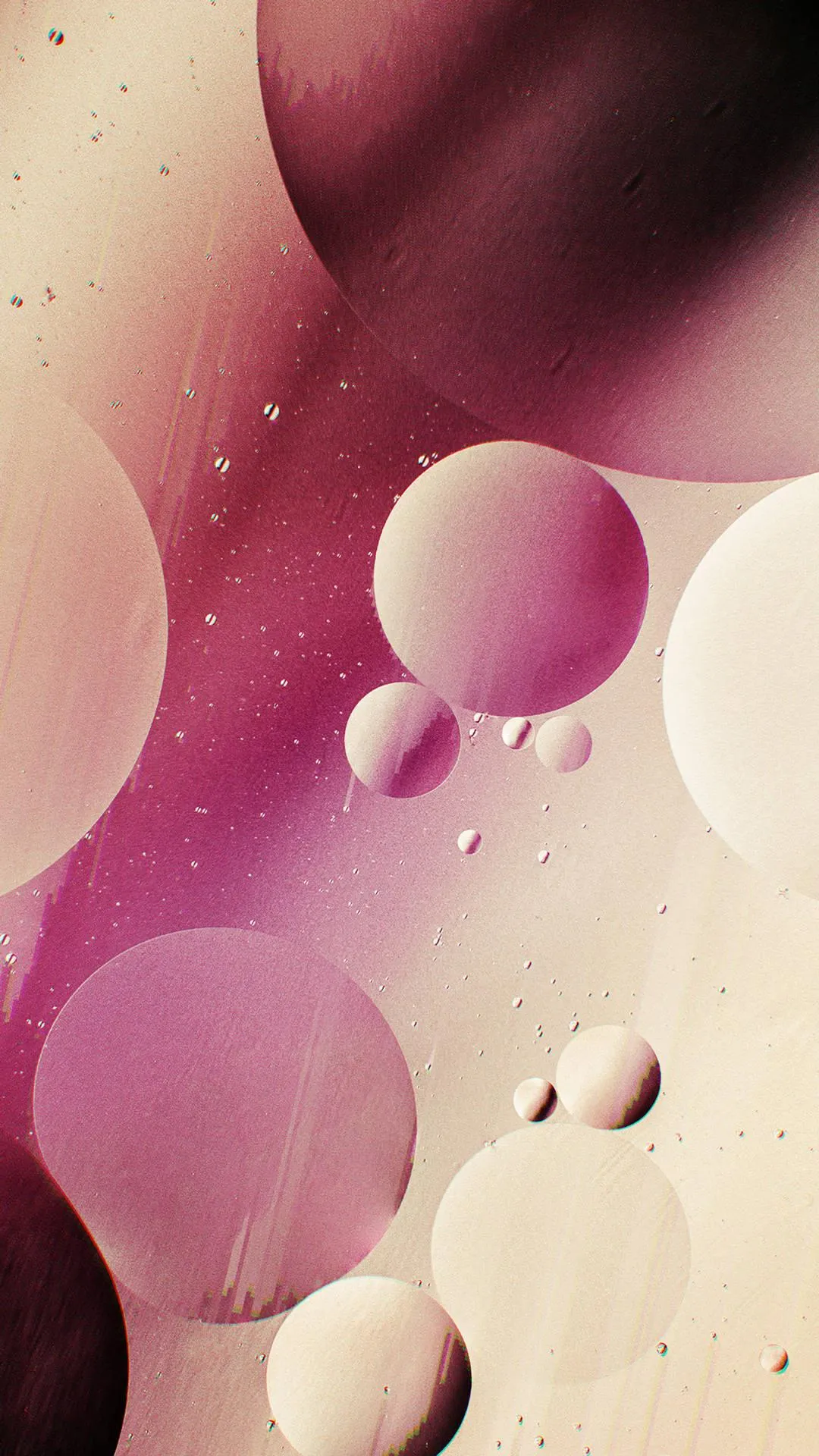 Oil bubbles float in soft creamy coloured liquid Wallpaper
