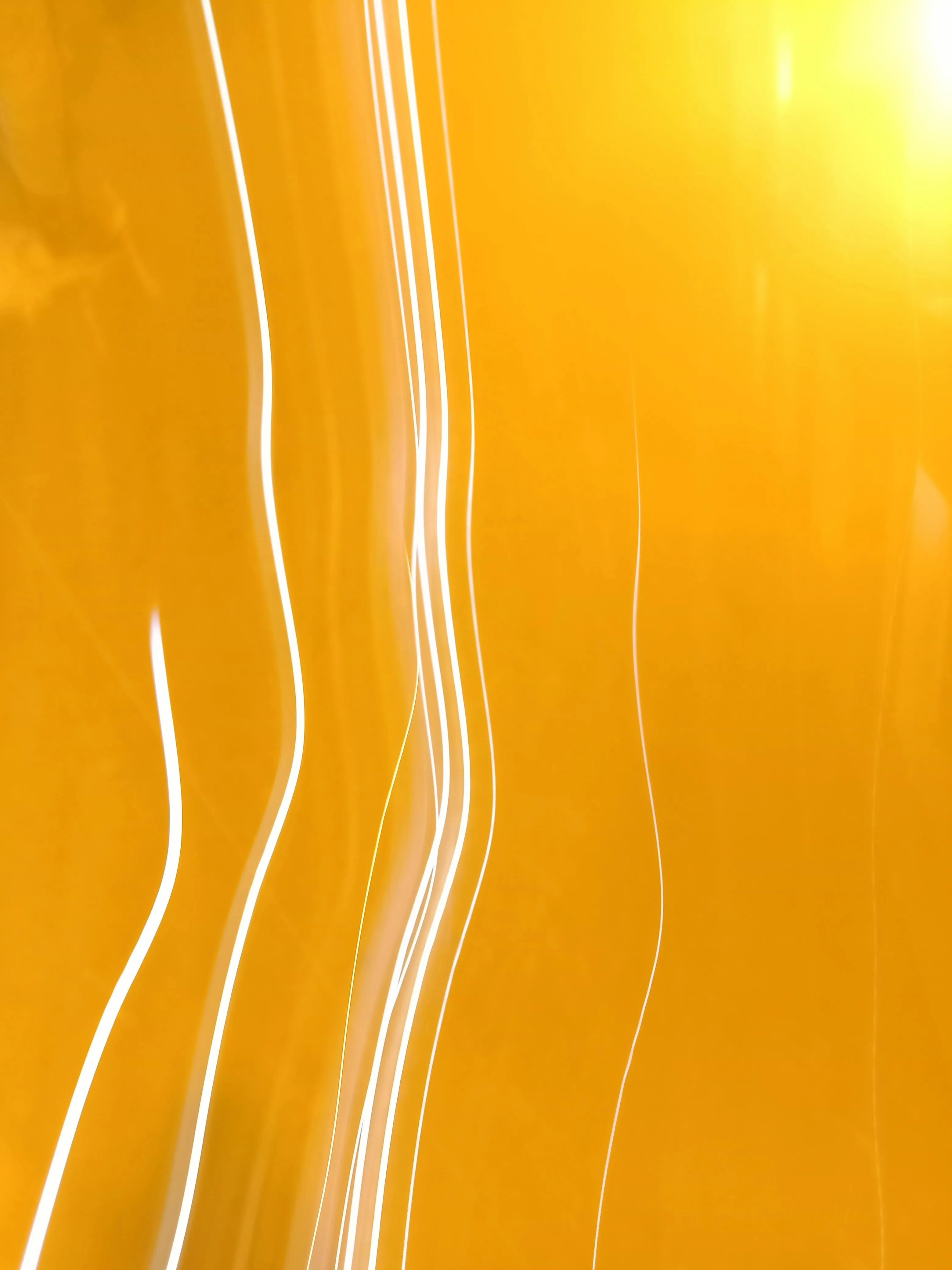 Orange light streaks creating a warm abstract background