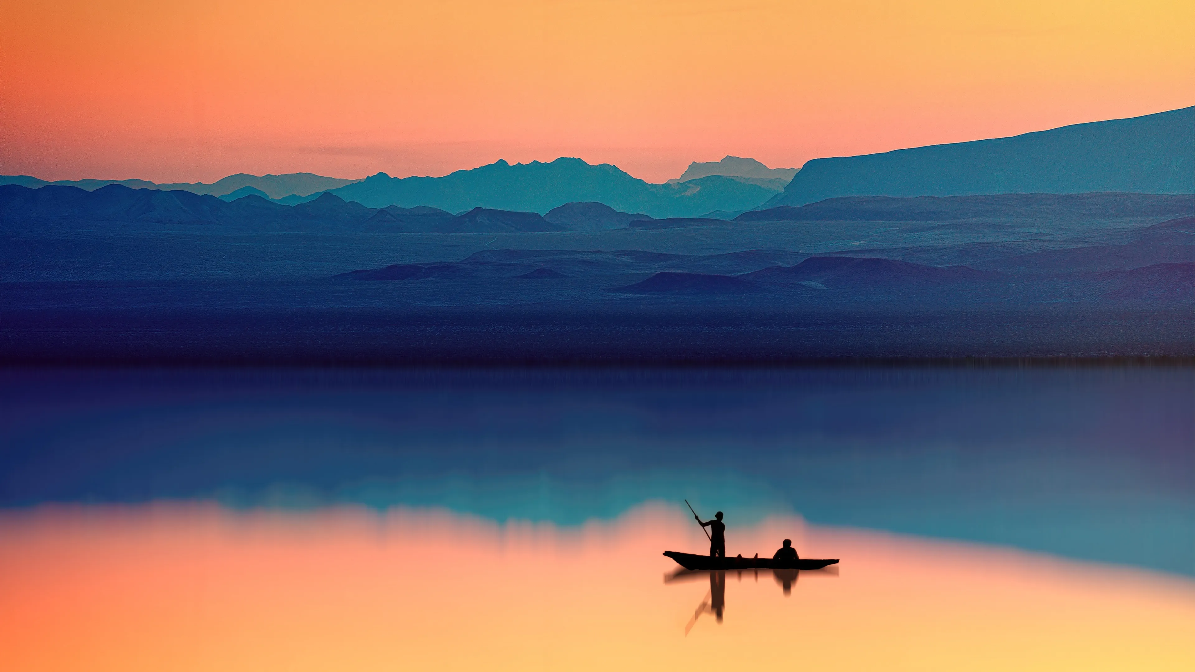 Peaceful lake sunset with a boat and mountain view Wallpaper
