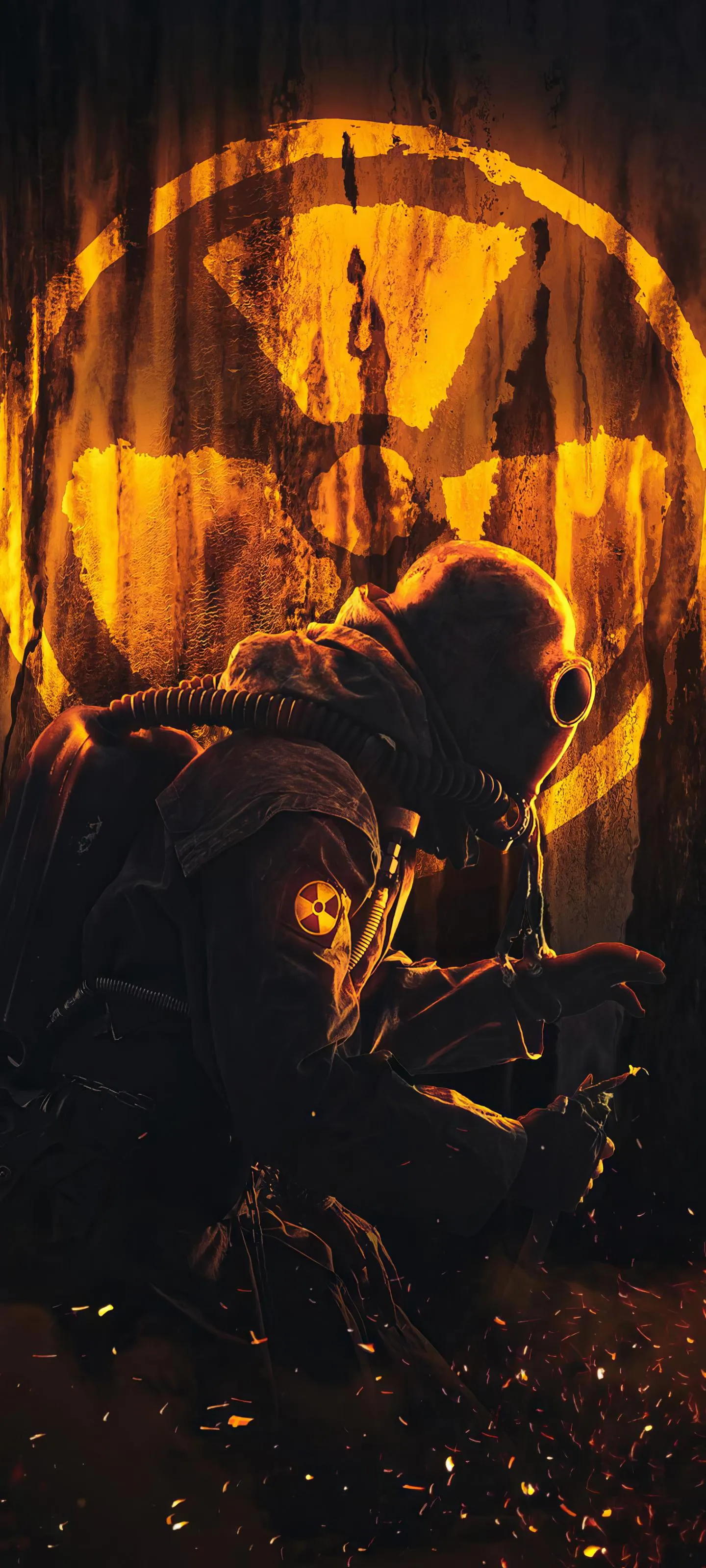 Person in Hazmat Suit Kneeling Near Nuclear Symbol free image