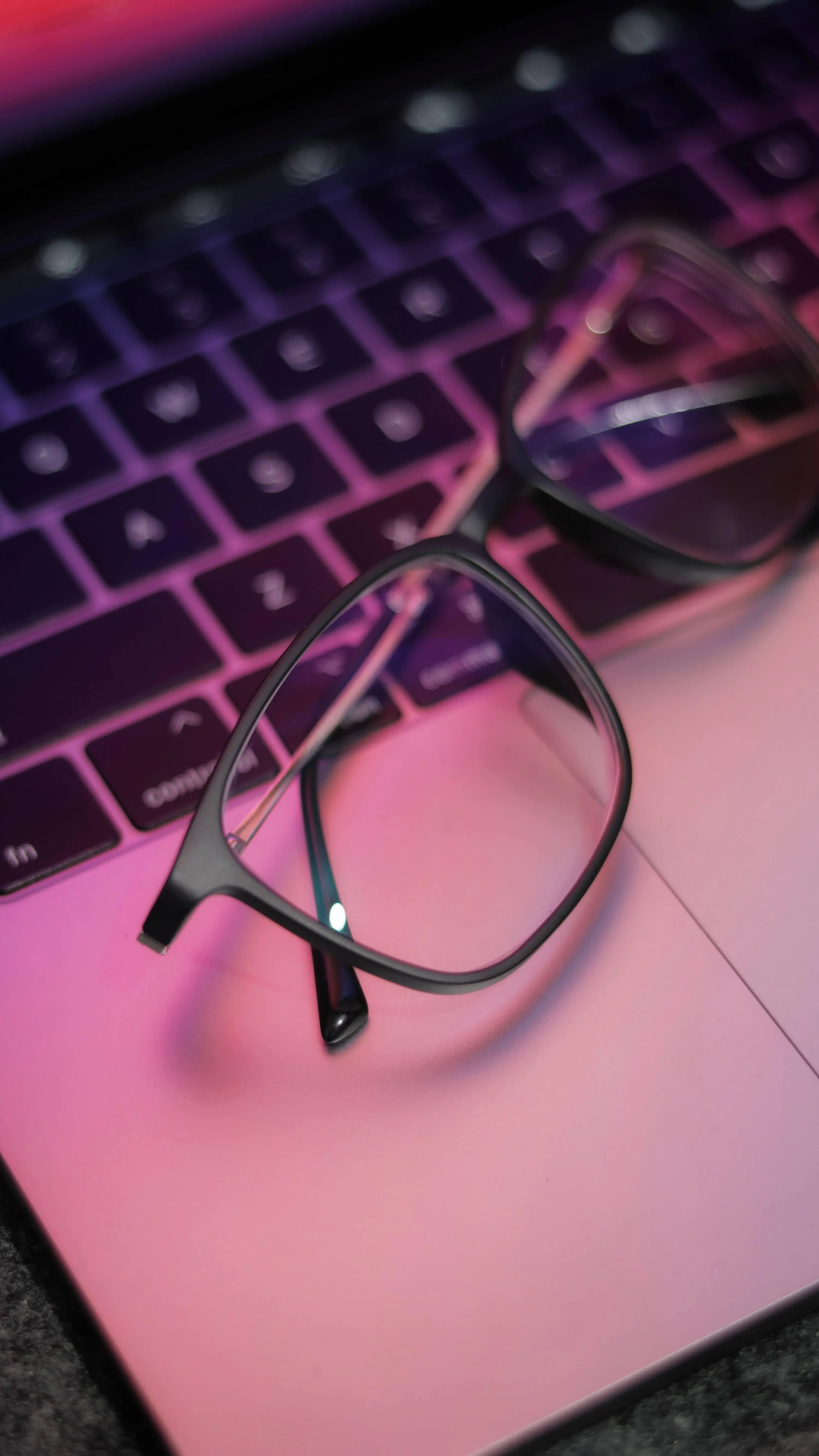 Pink Keyboard with Glasses and Colorful Reflection Mobile