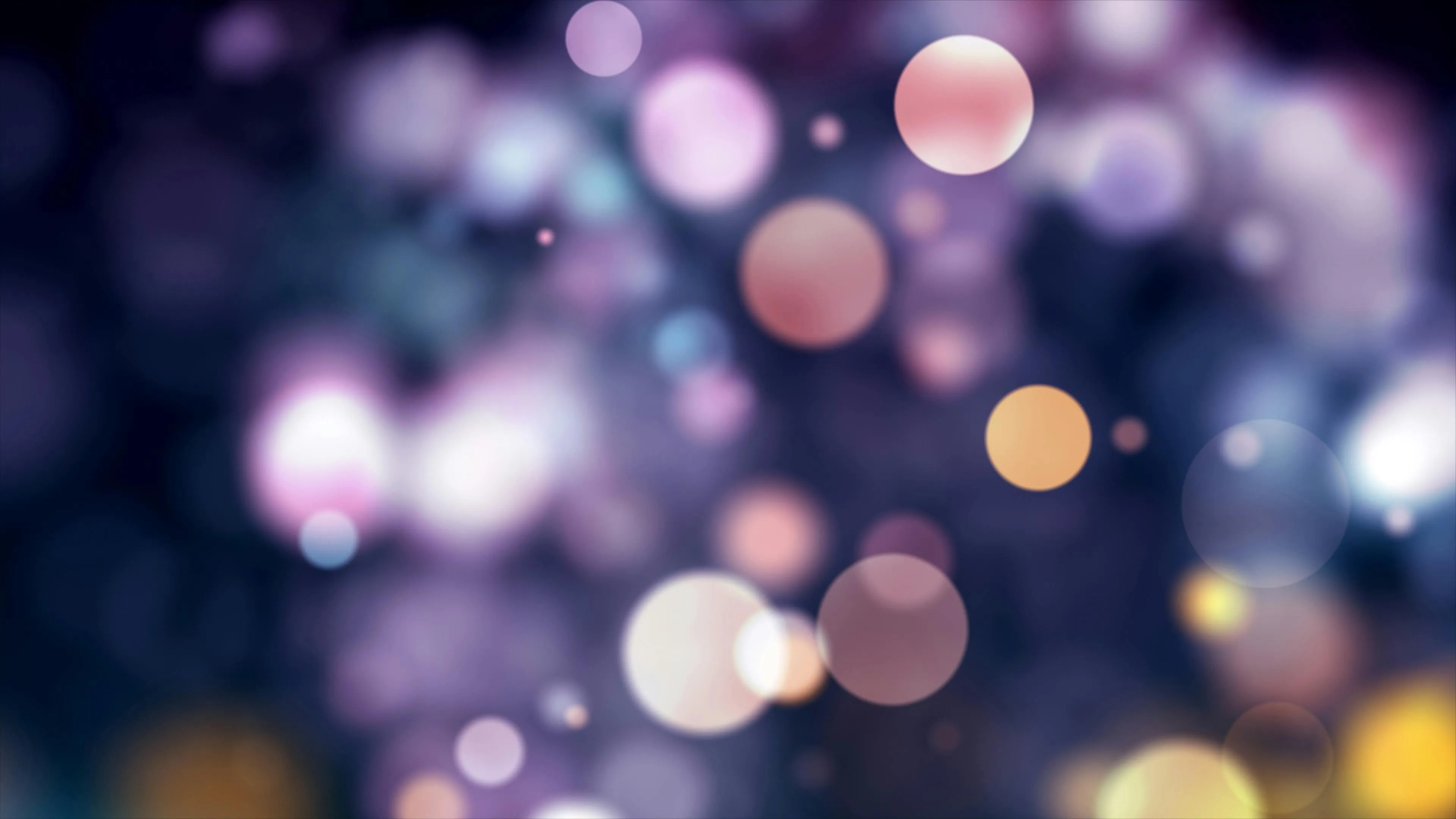 Purple and yellow bokeh lights with a blurred background