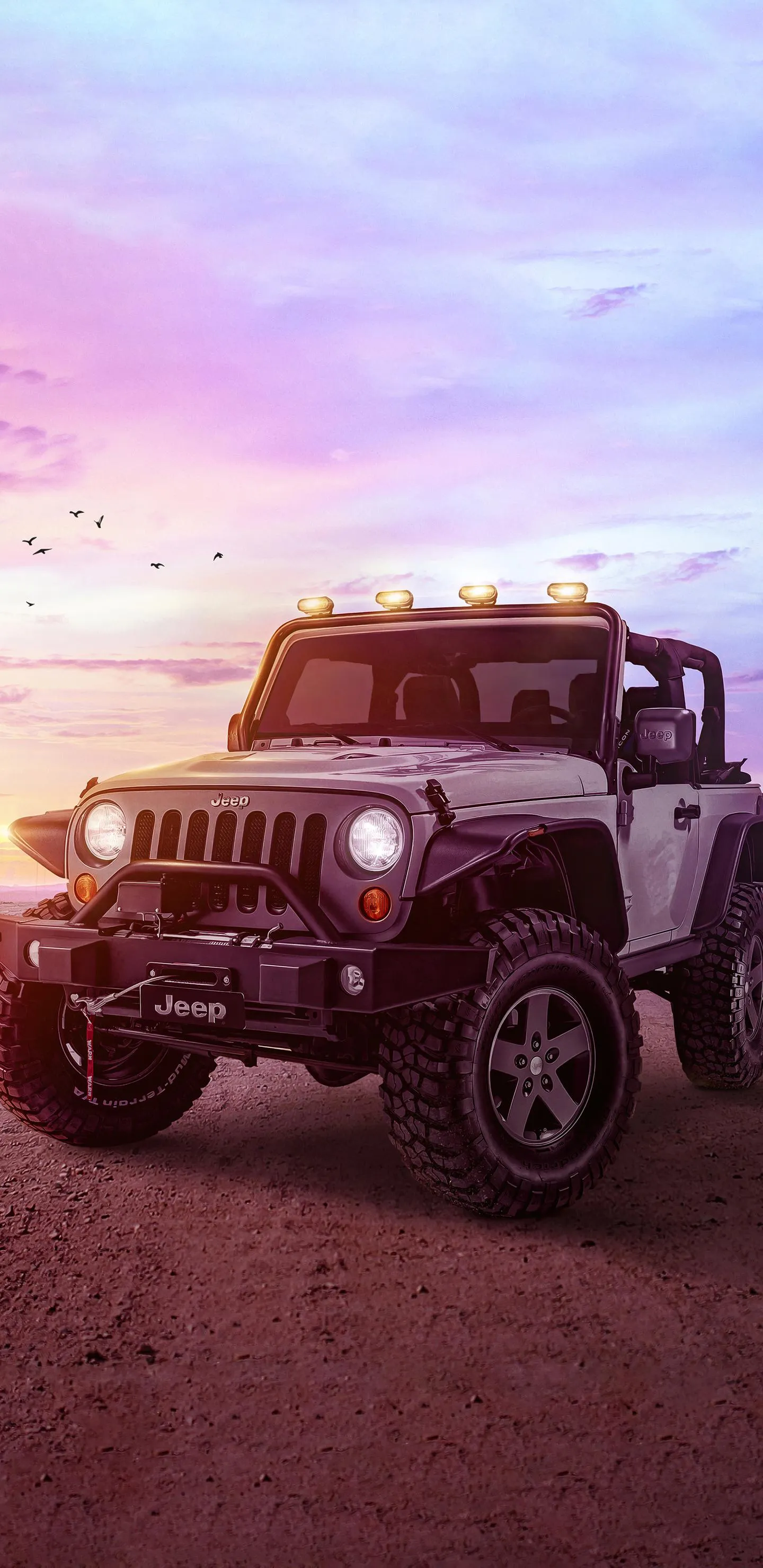 Red Off Road Jeep Driving on Mountain Road at Sunset