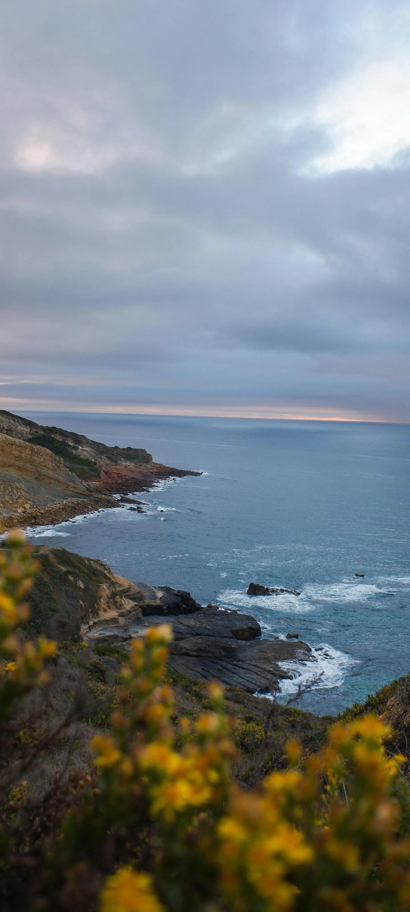 Rocky Seaside Cliff View during Golden Hour Time Wallpaper