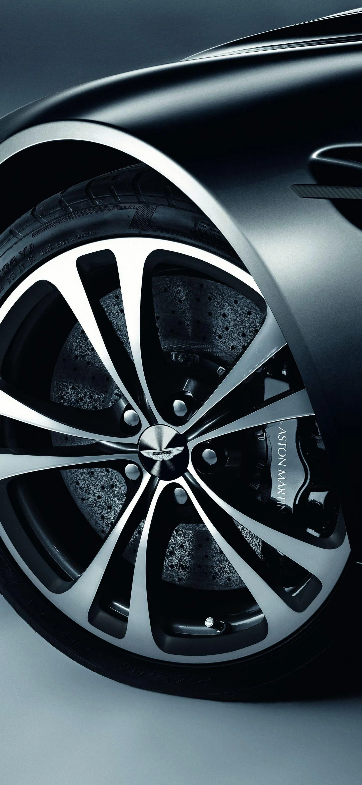 Shiny modern car wheel rim with metallic finish Wallpaper