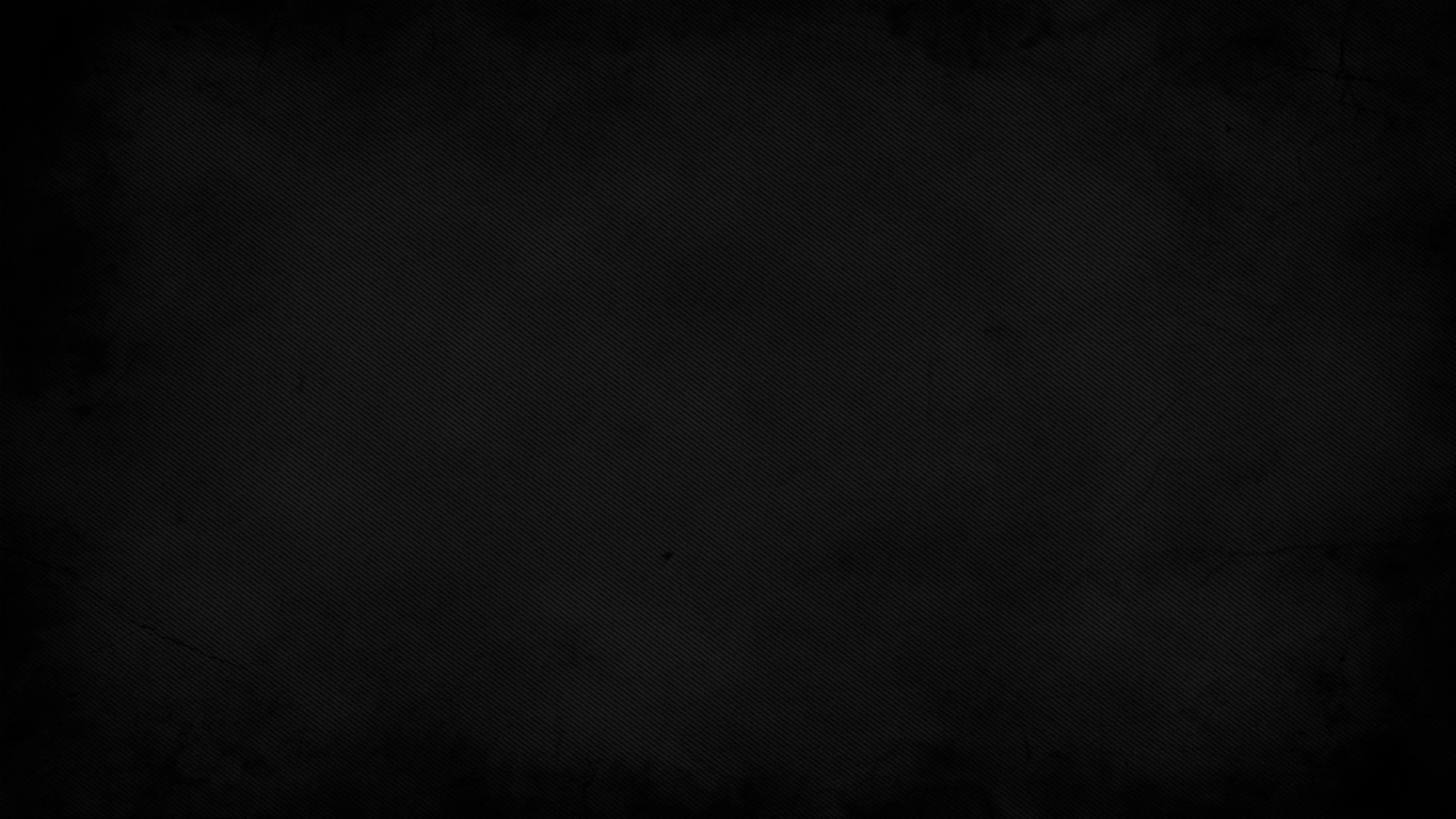 Simple black textured background for a clean desktop look