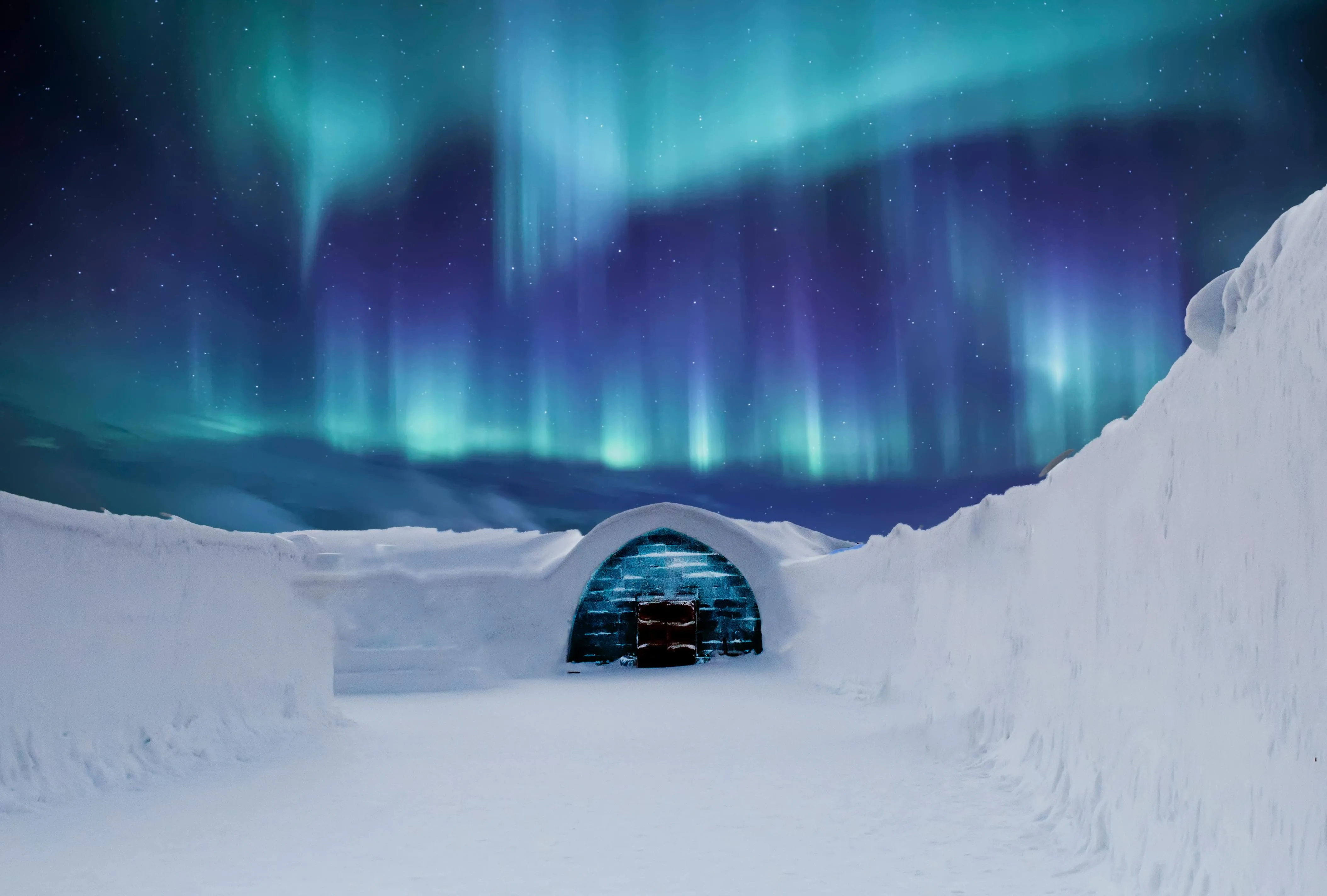 Snowy igloo under vibrant northern lights aurora Wallpaper