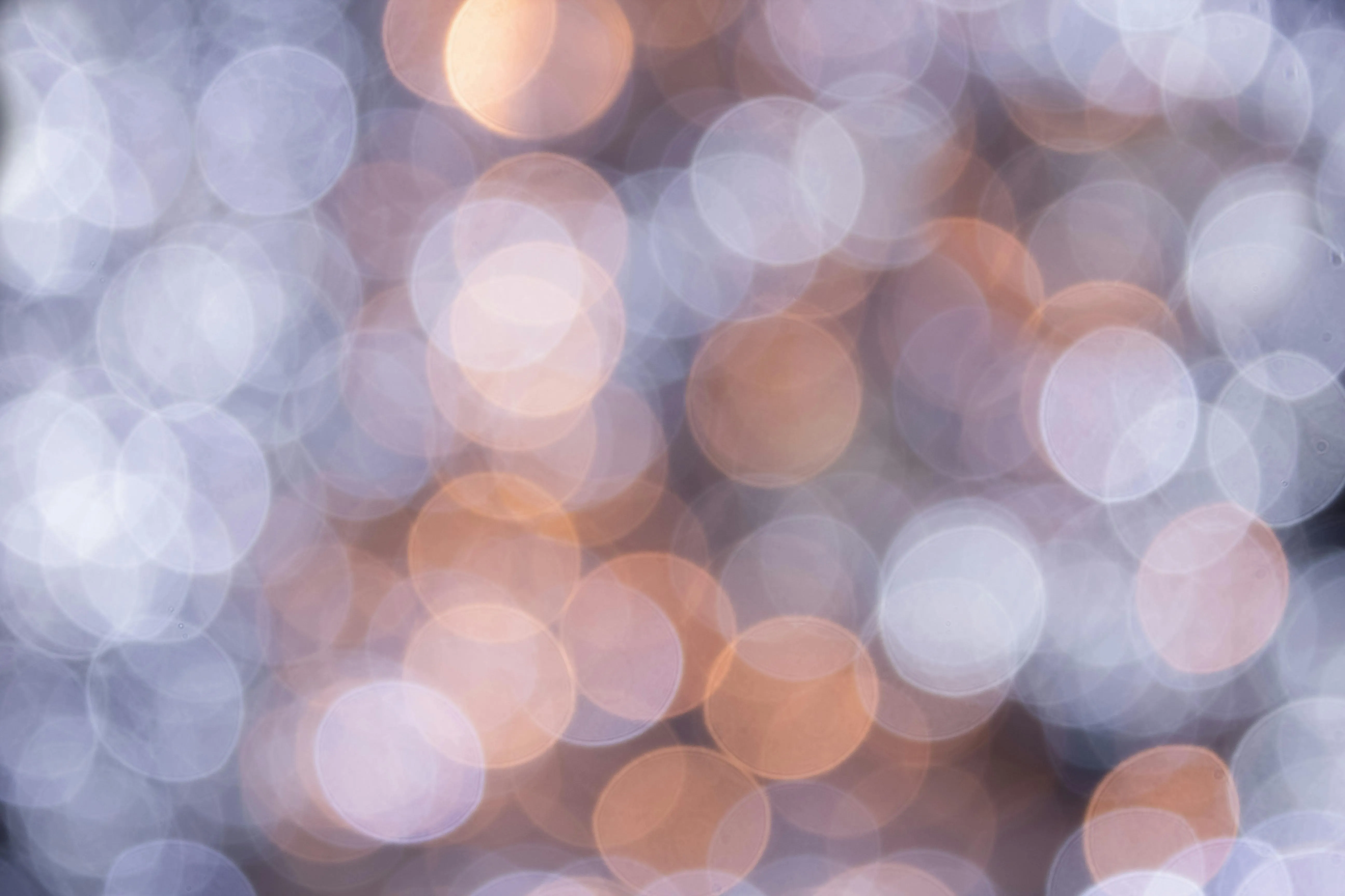 Soft bokeh lights in warm pastel tones free HD Wallpaper