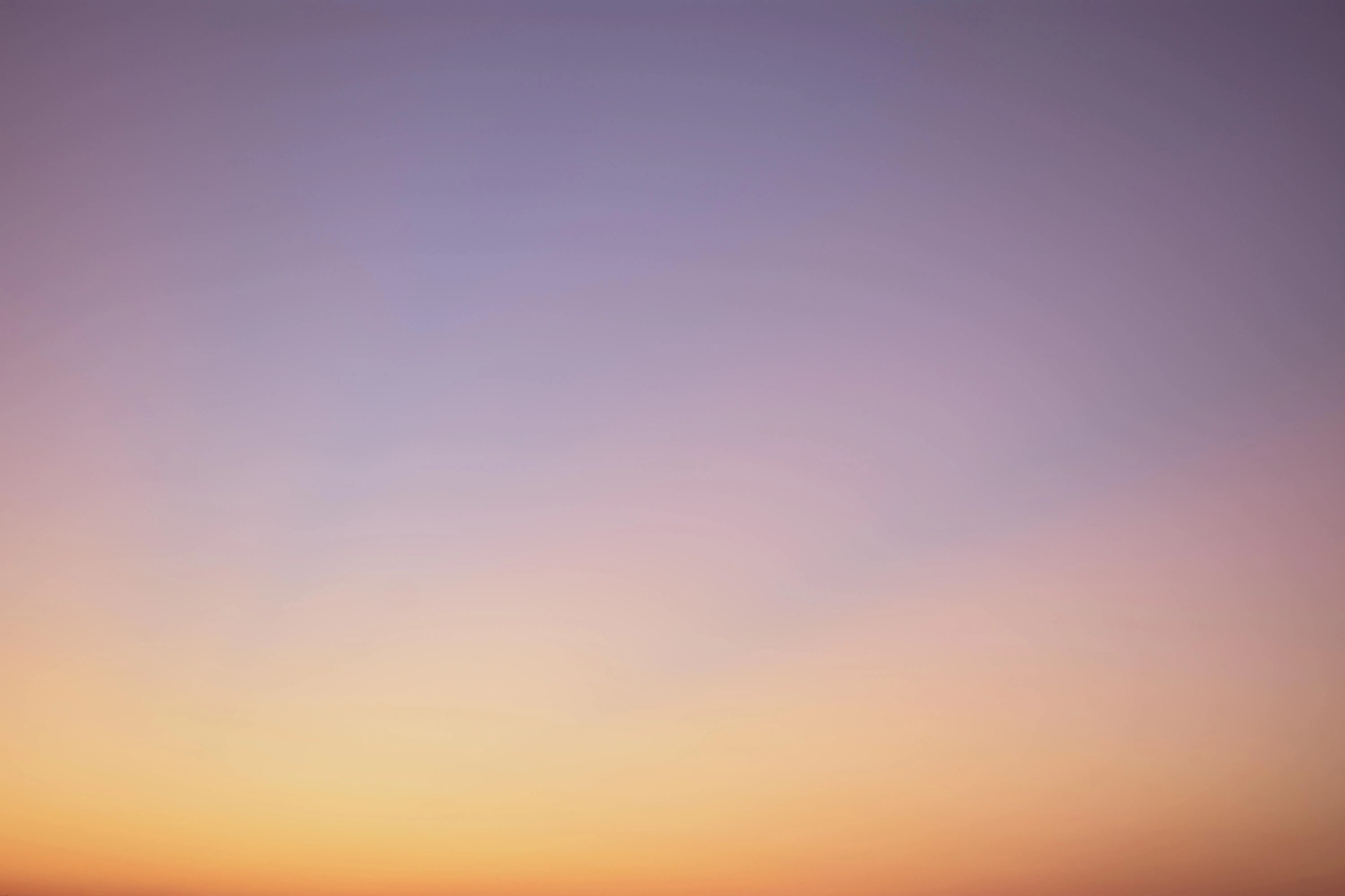 Soft gradient sky with purple and orange BackgroundWallpaper