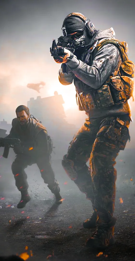 Soldiers in Battle Armor in Smoky War Zone Scene Wallpaper