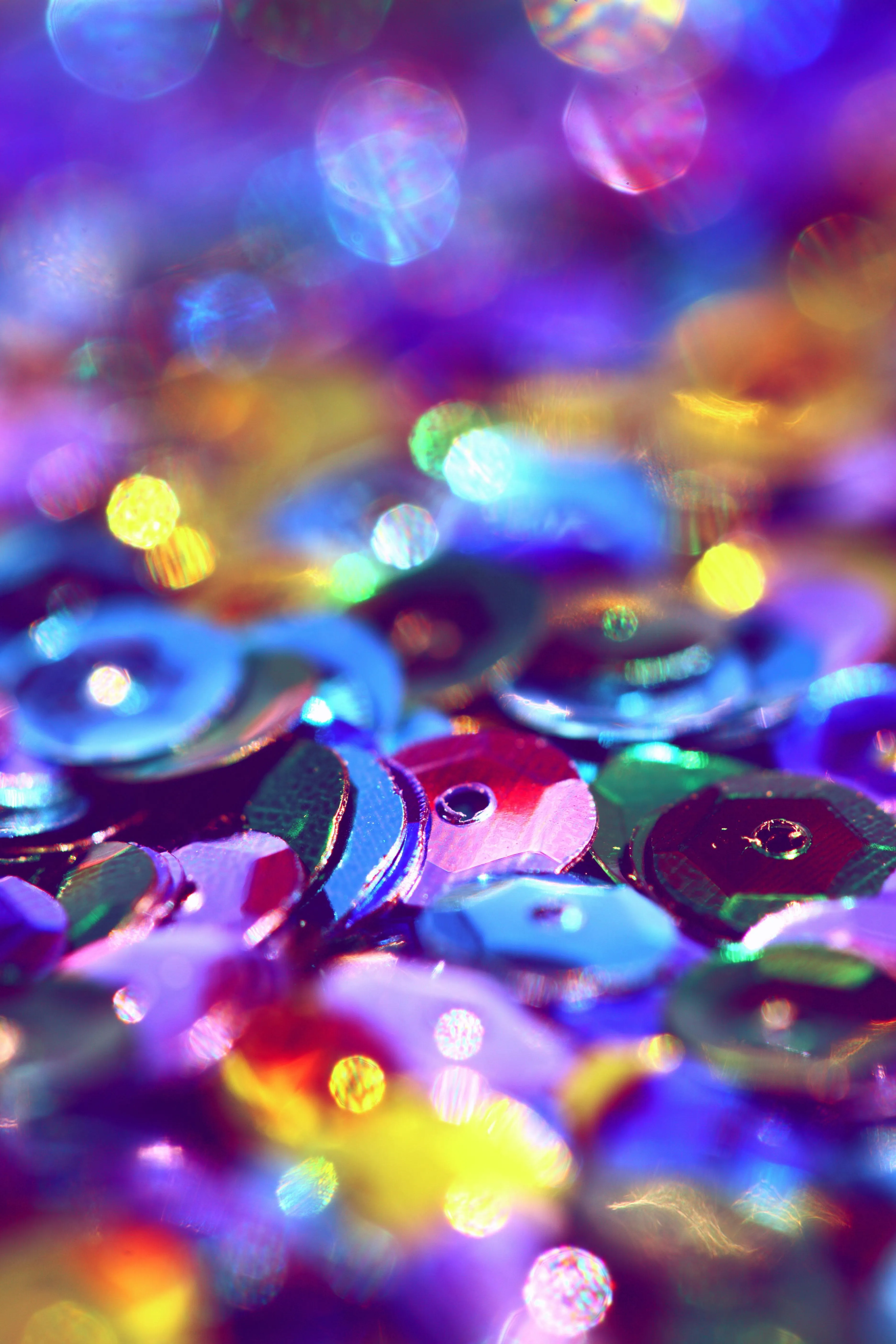 Sparkling colourful sequins with glowing light effects image