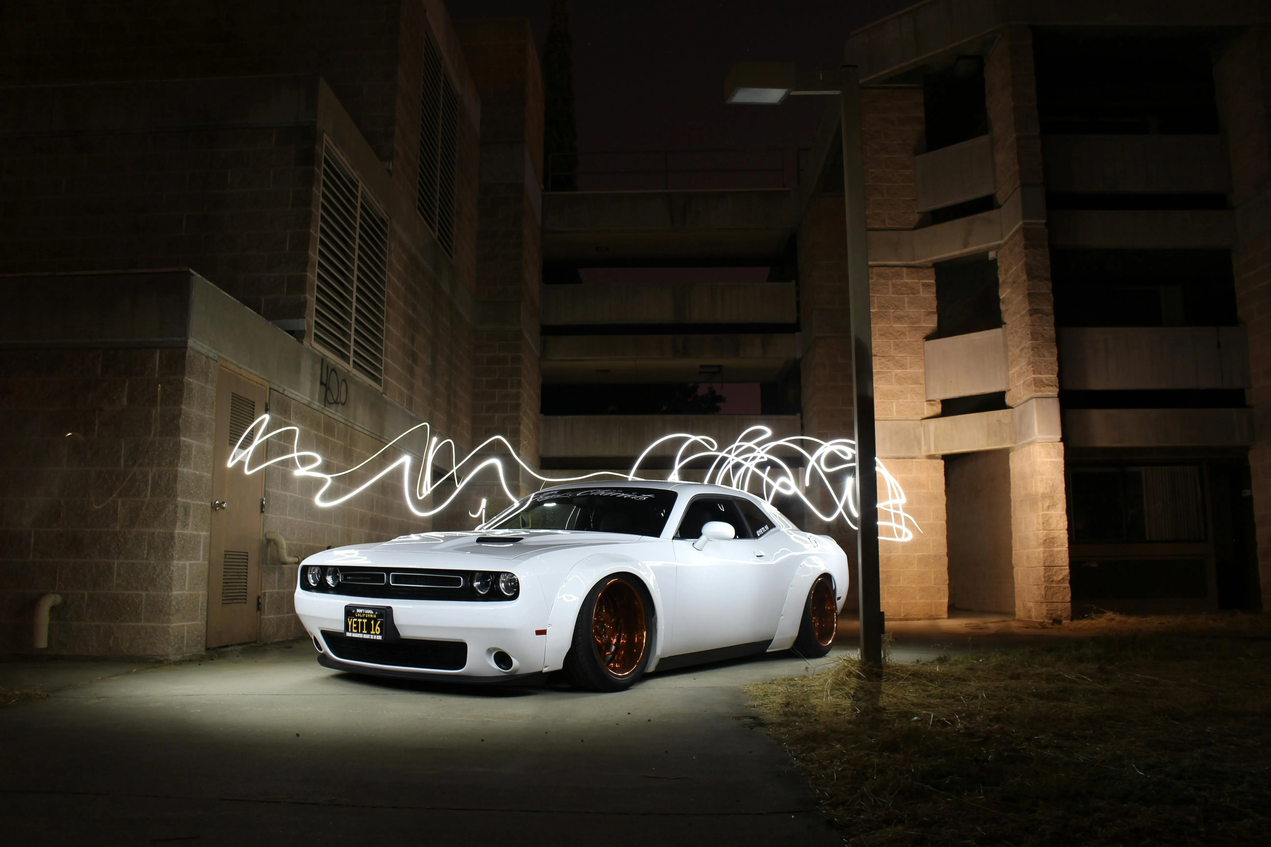Sports car at night with creative light painting effect HD