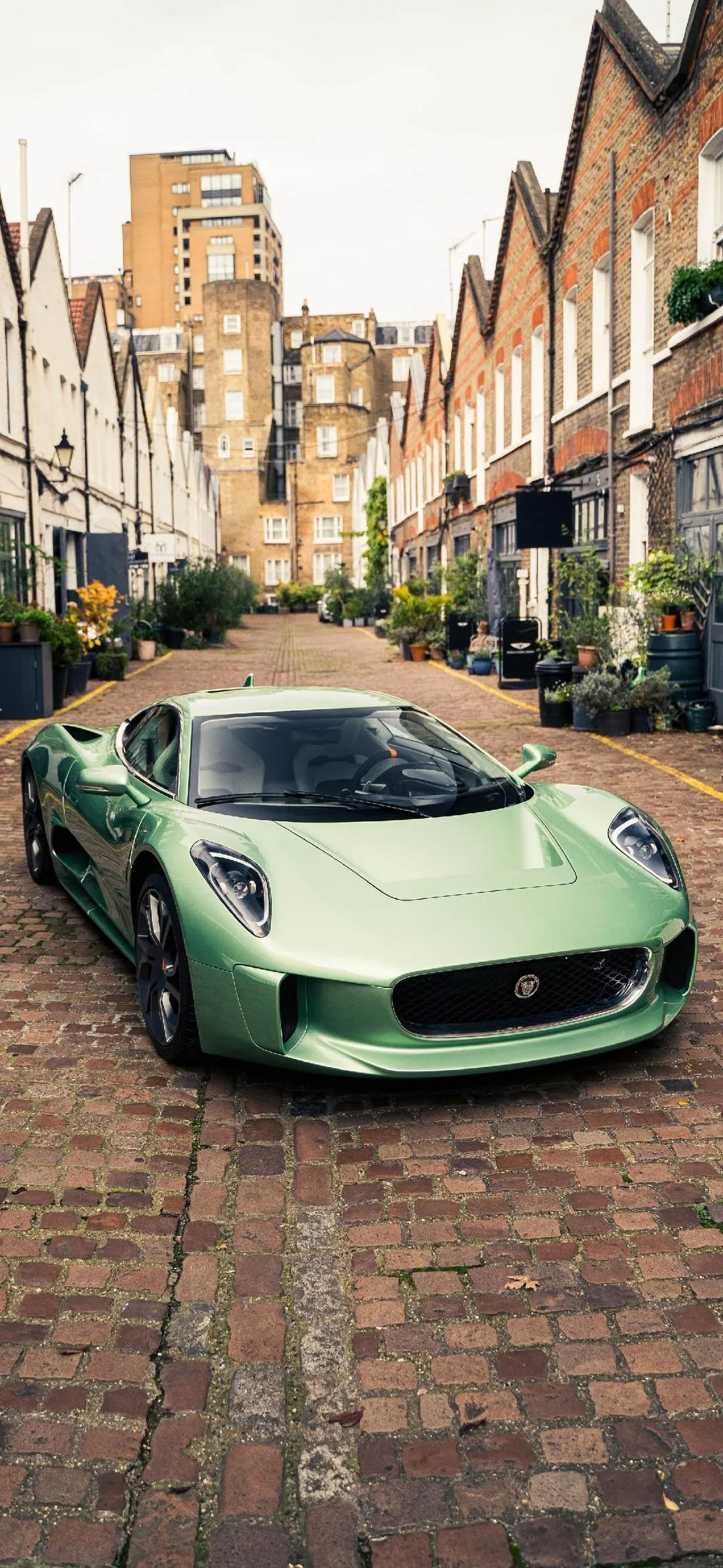 Sports car in historic city street with vintage charm