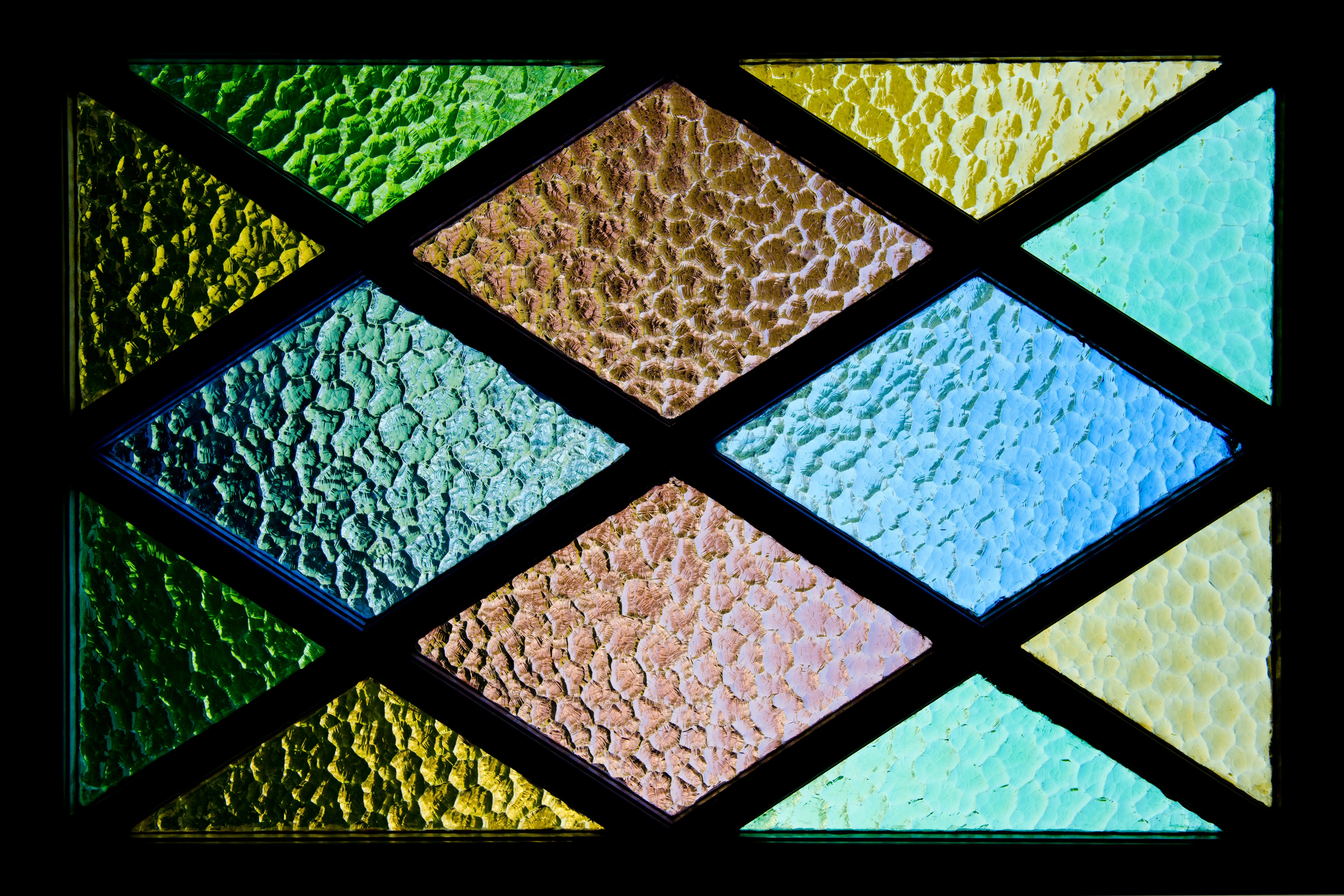 Stained glass window with bright colours free Wallpaper