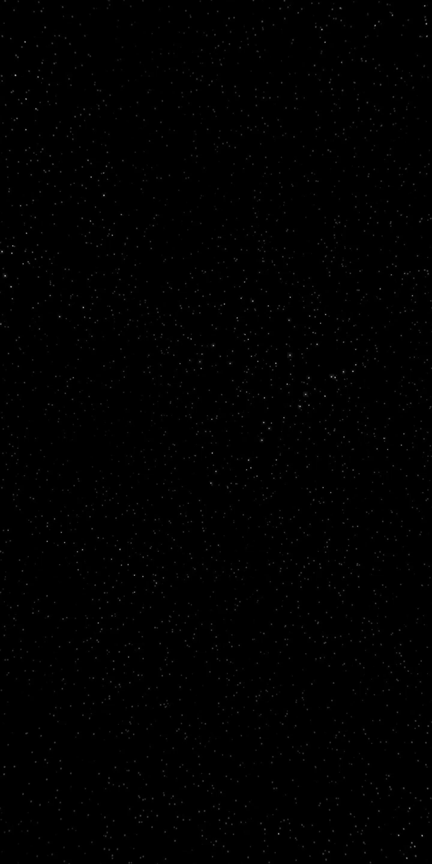 Starry black night sky with scattered tiny dots Wallpaper