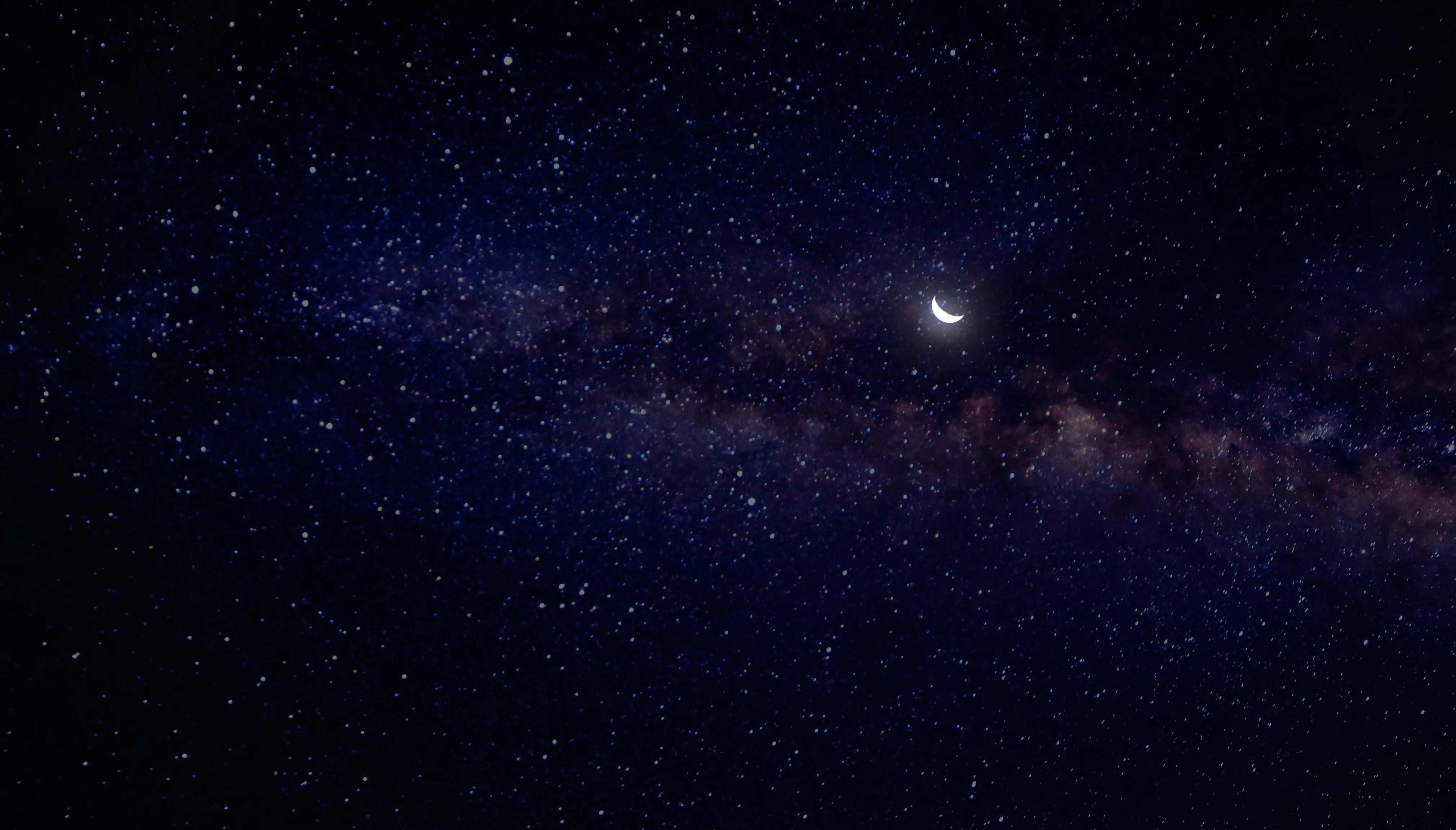 Starry night sky with Milky Way and the crescent moon HD
