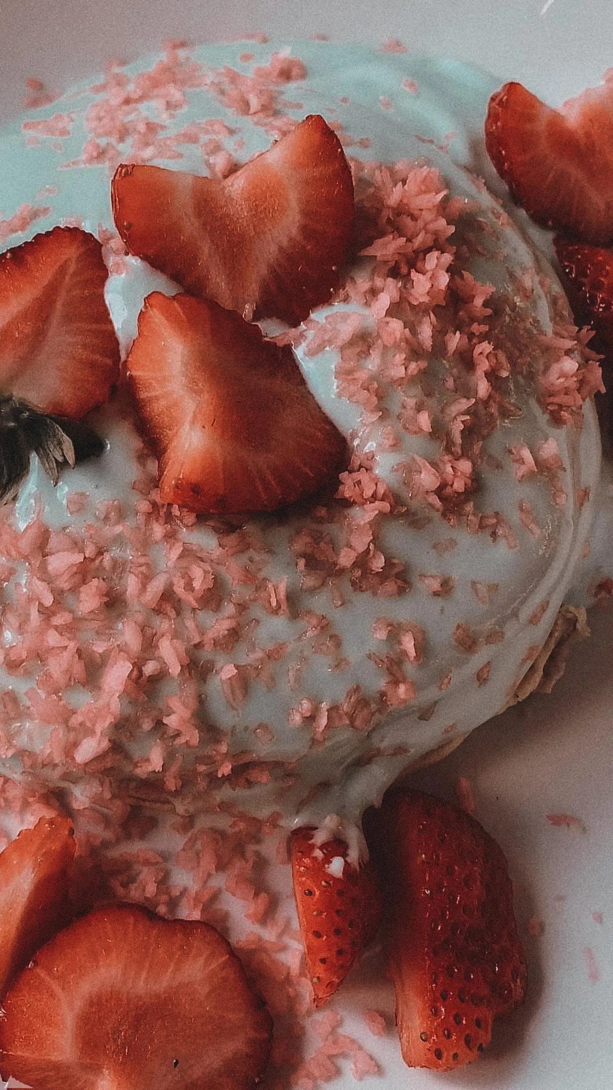 Strawberry Ice Cream Topped with Real Fruit Pieces Wallpaper