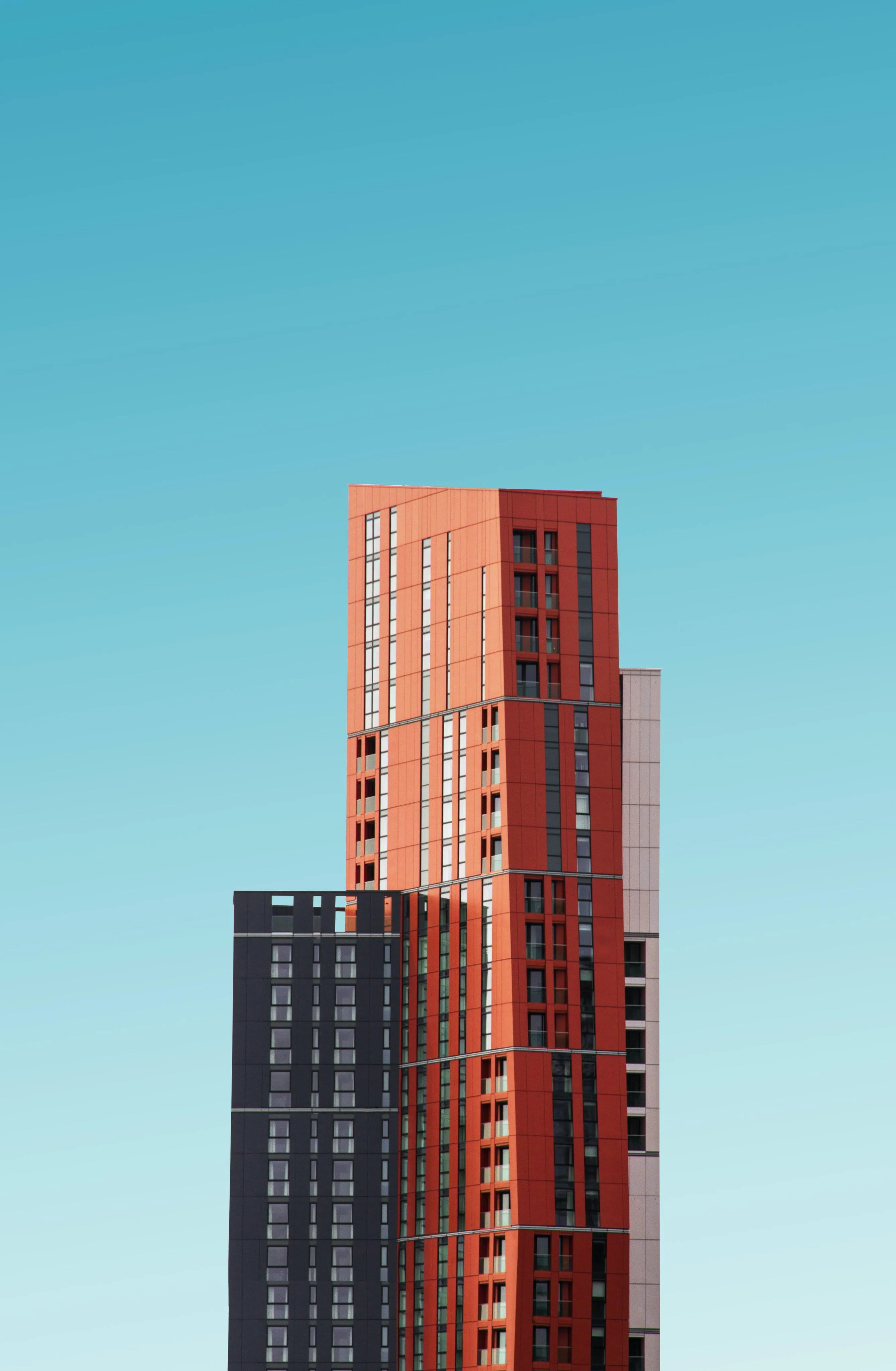 Tall Modern Skyscraper with Glass and Brick Facade