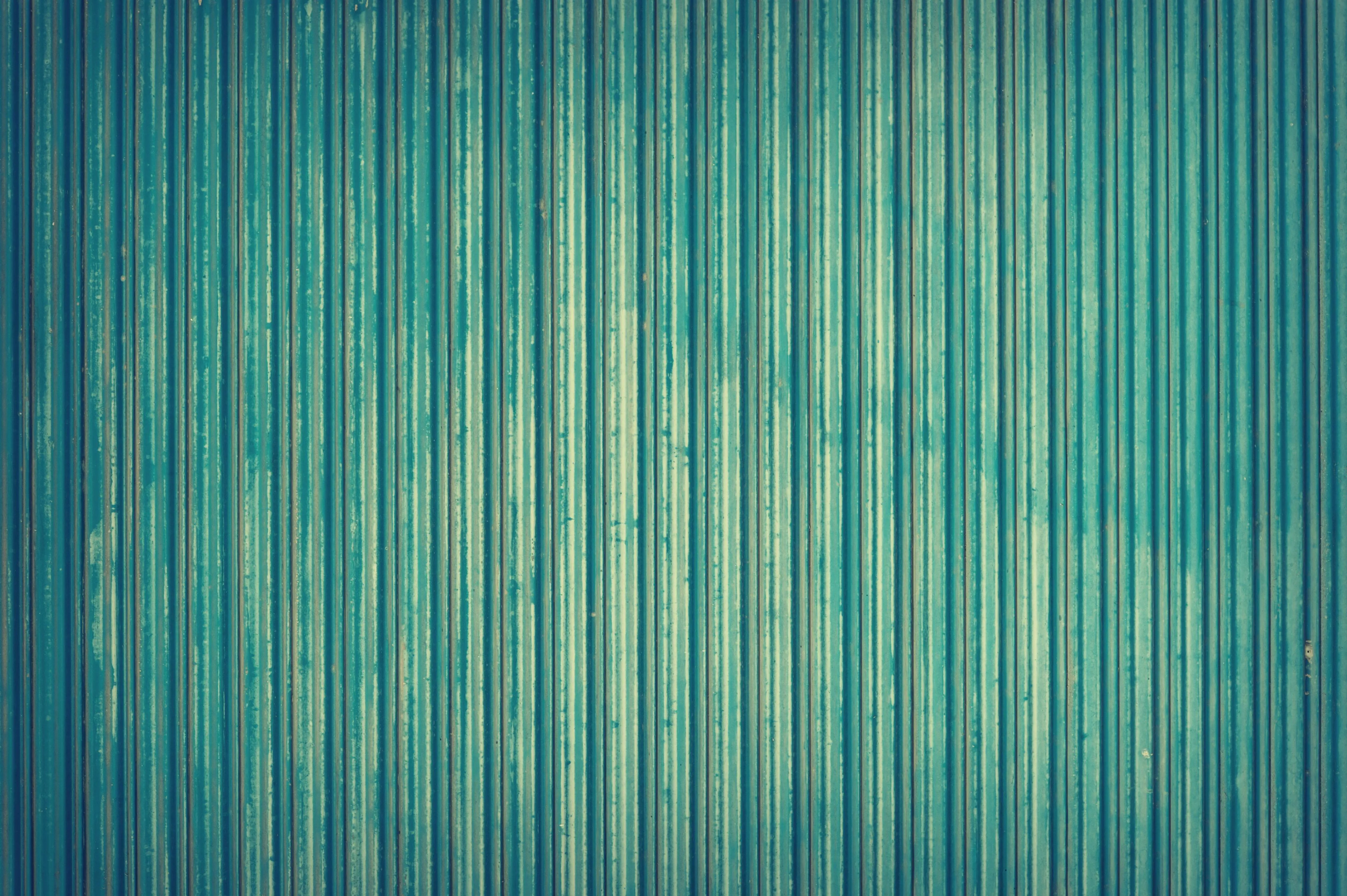 Teal painted metal Wrinkled surface background Wallpaper