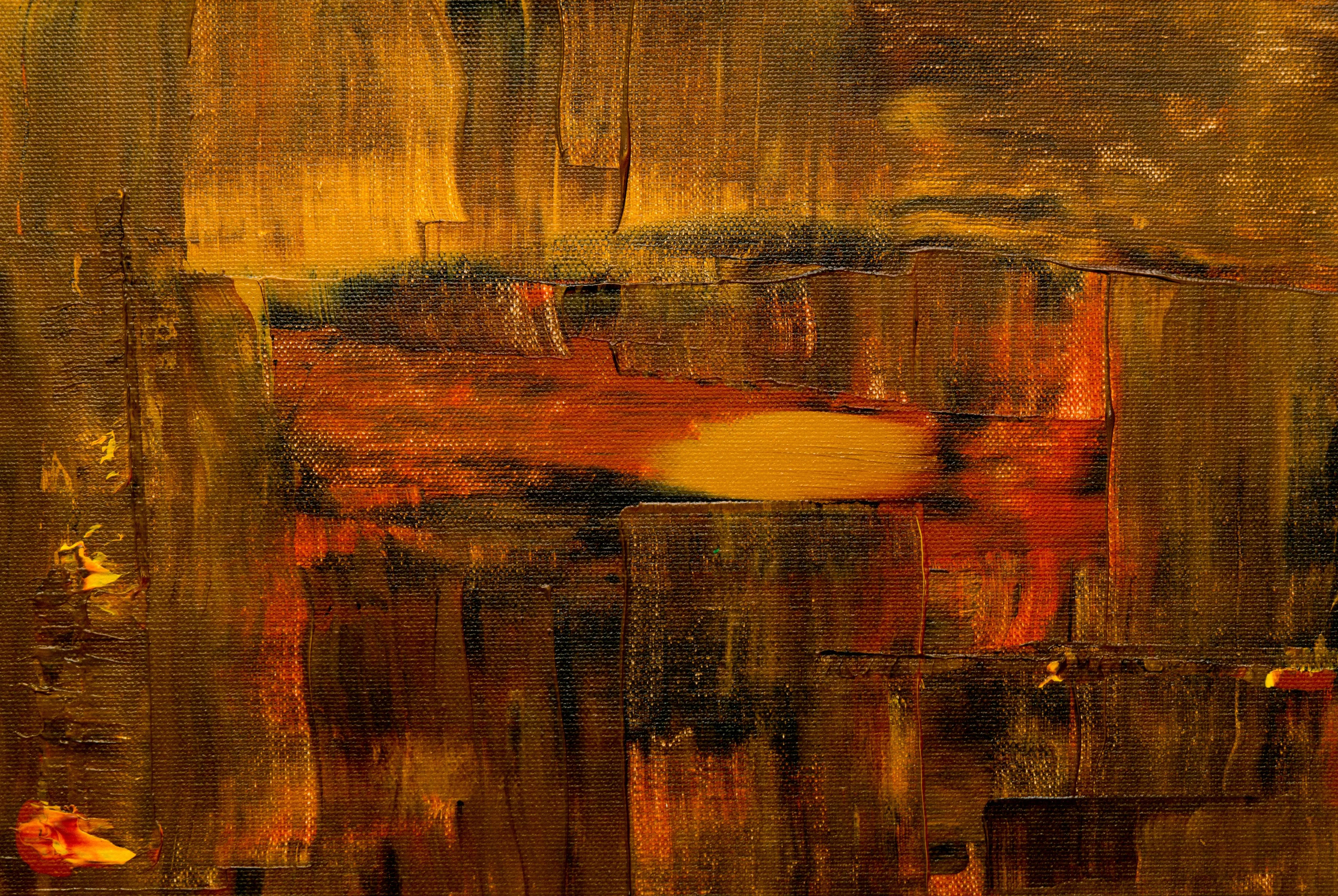 Textured abstract art with warm golden and dark brown shades