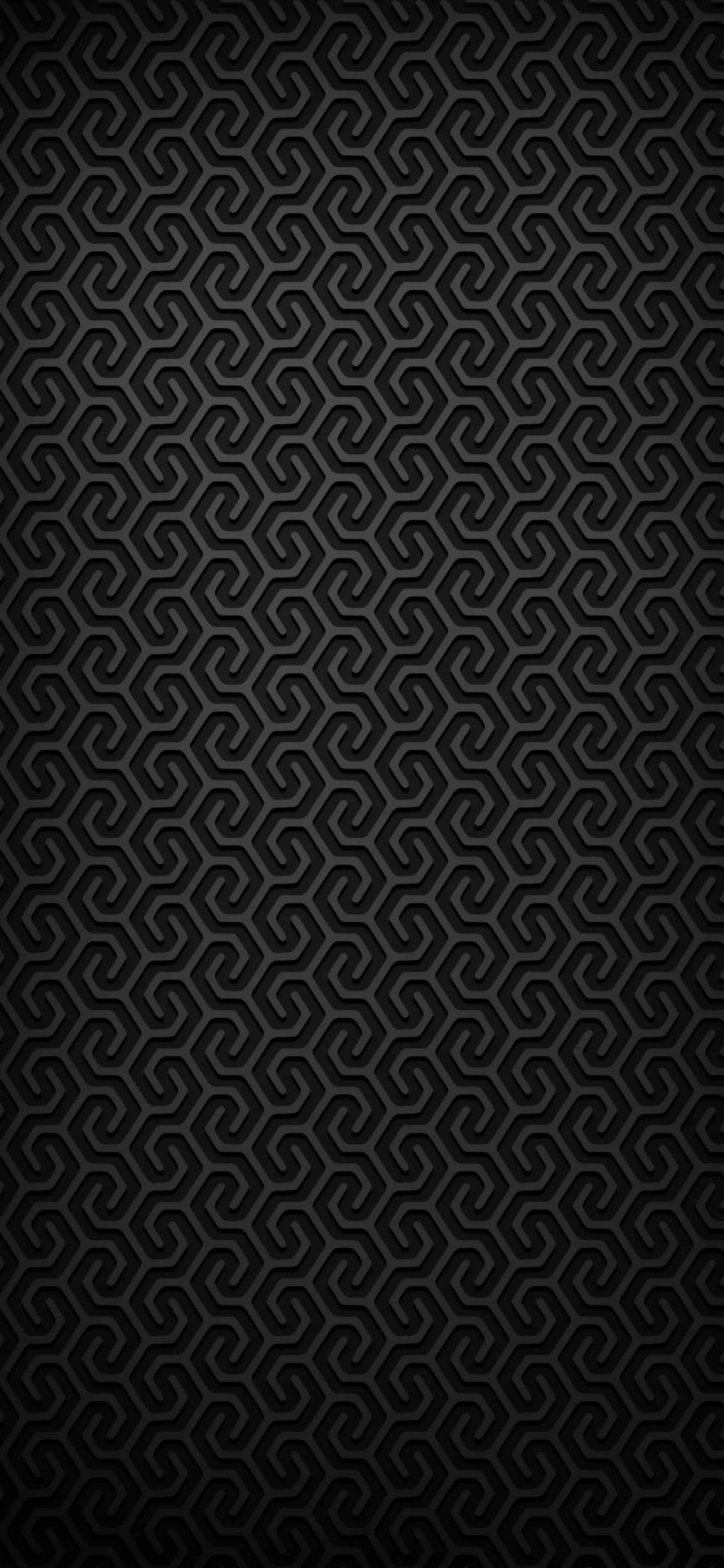 Textured Black Surface with Small Dots and Patterns