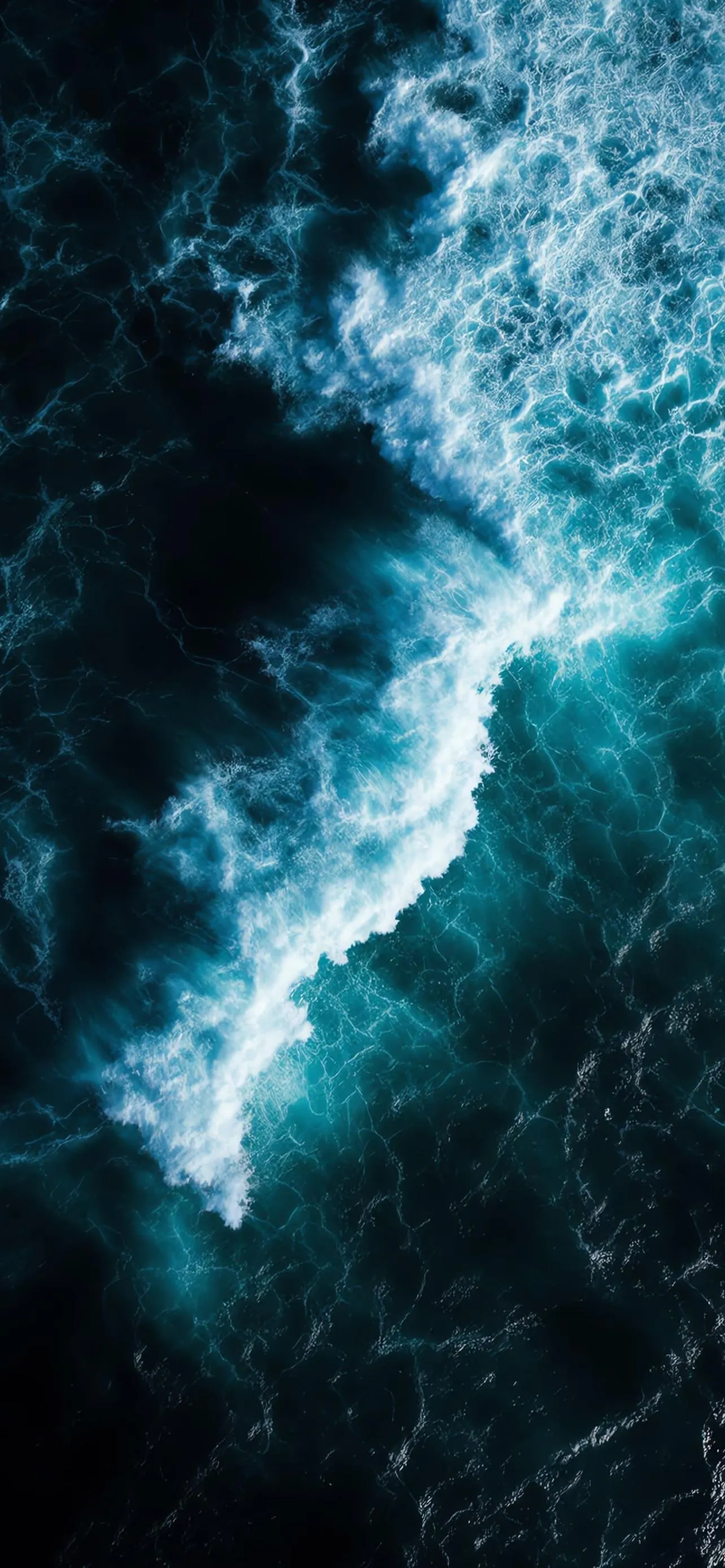Turbulent Ocean Waves Crashing with Deep Blue Colors
