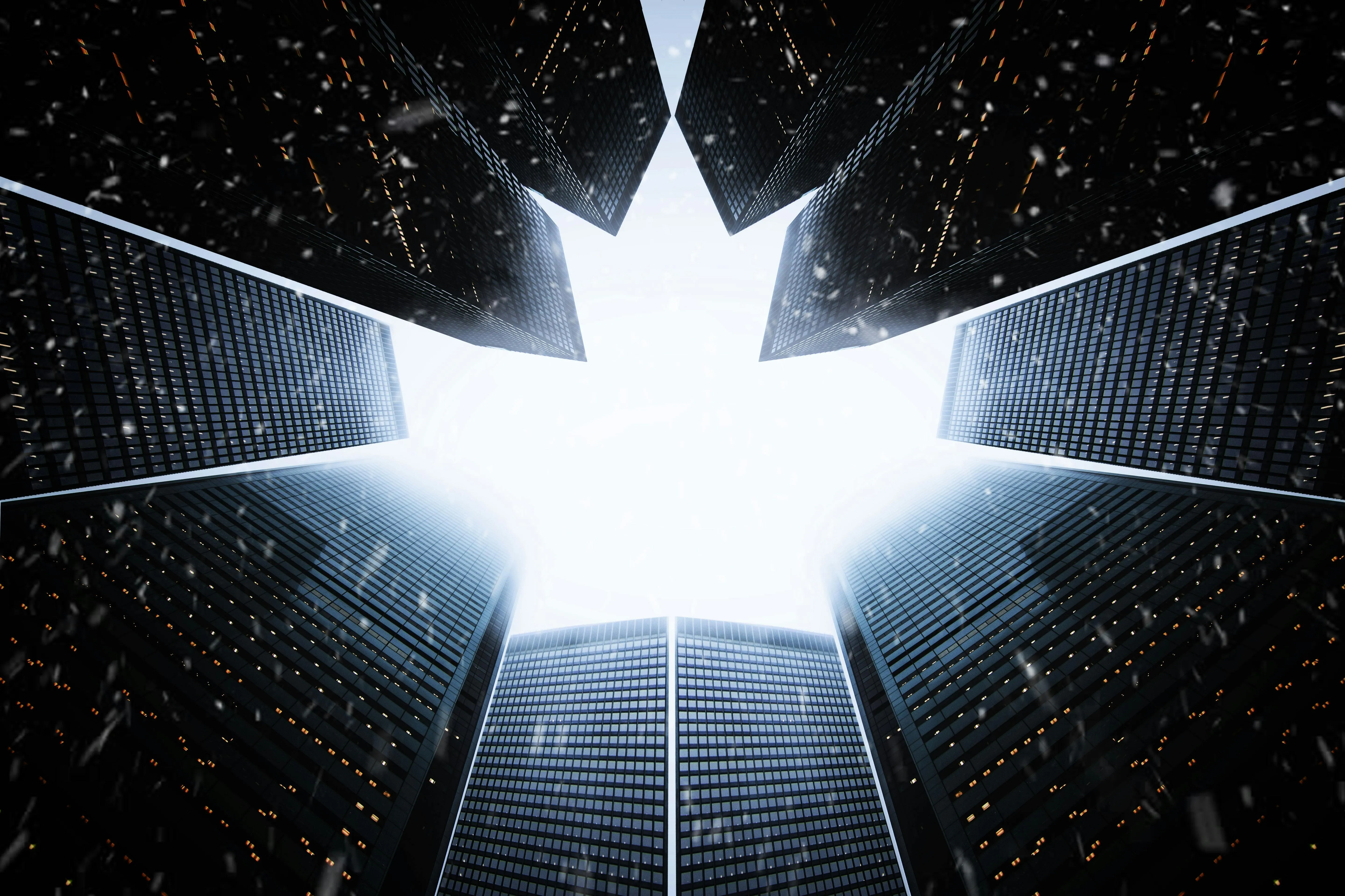 Upward view of skyscrapers forming a snowflakes shaped sky