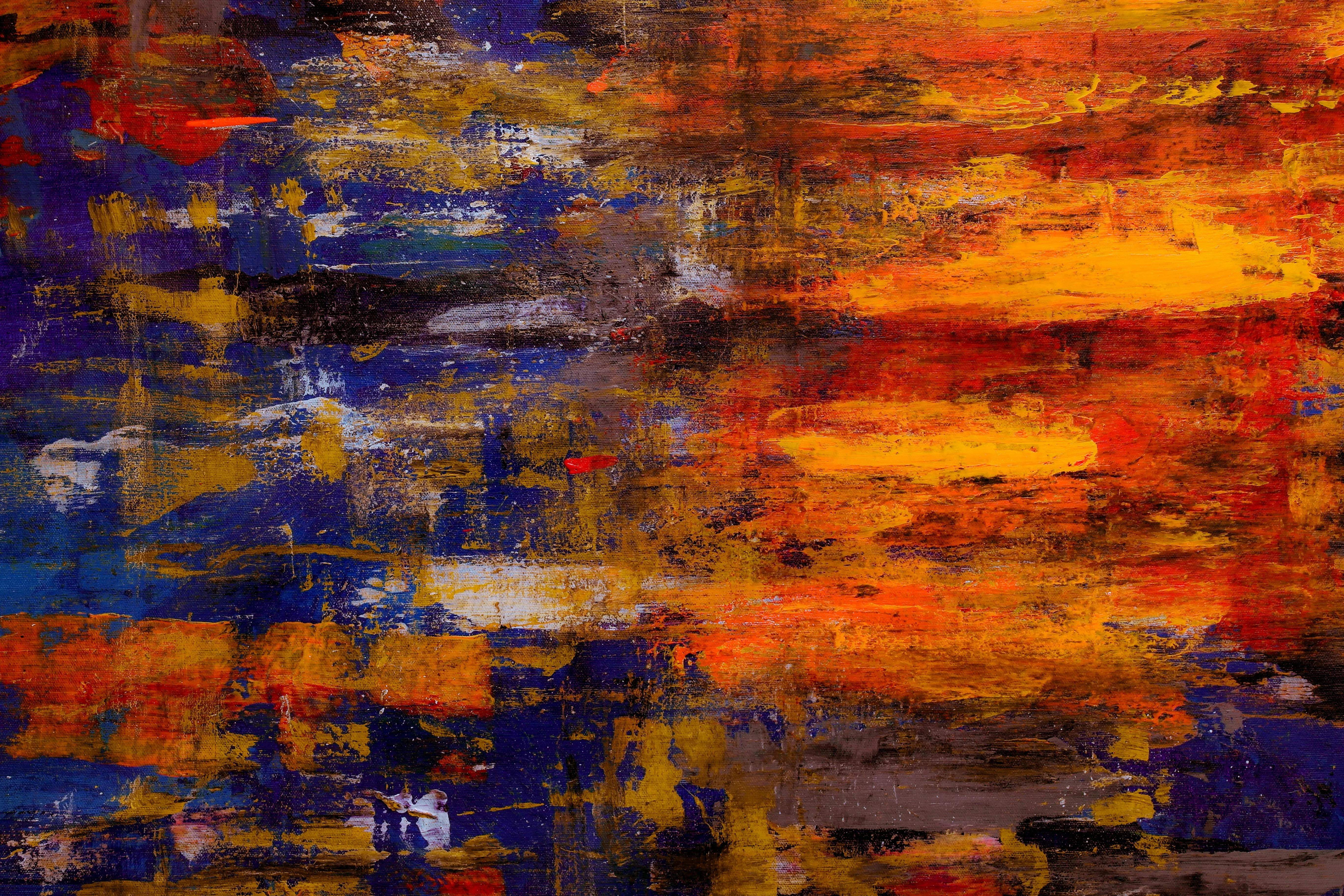 Vibrant orange and blue abstract paint texture Wallpaper