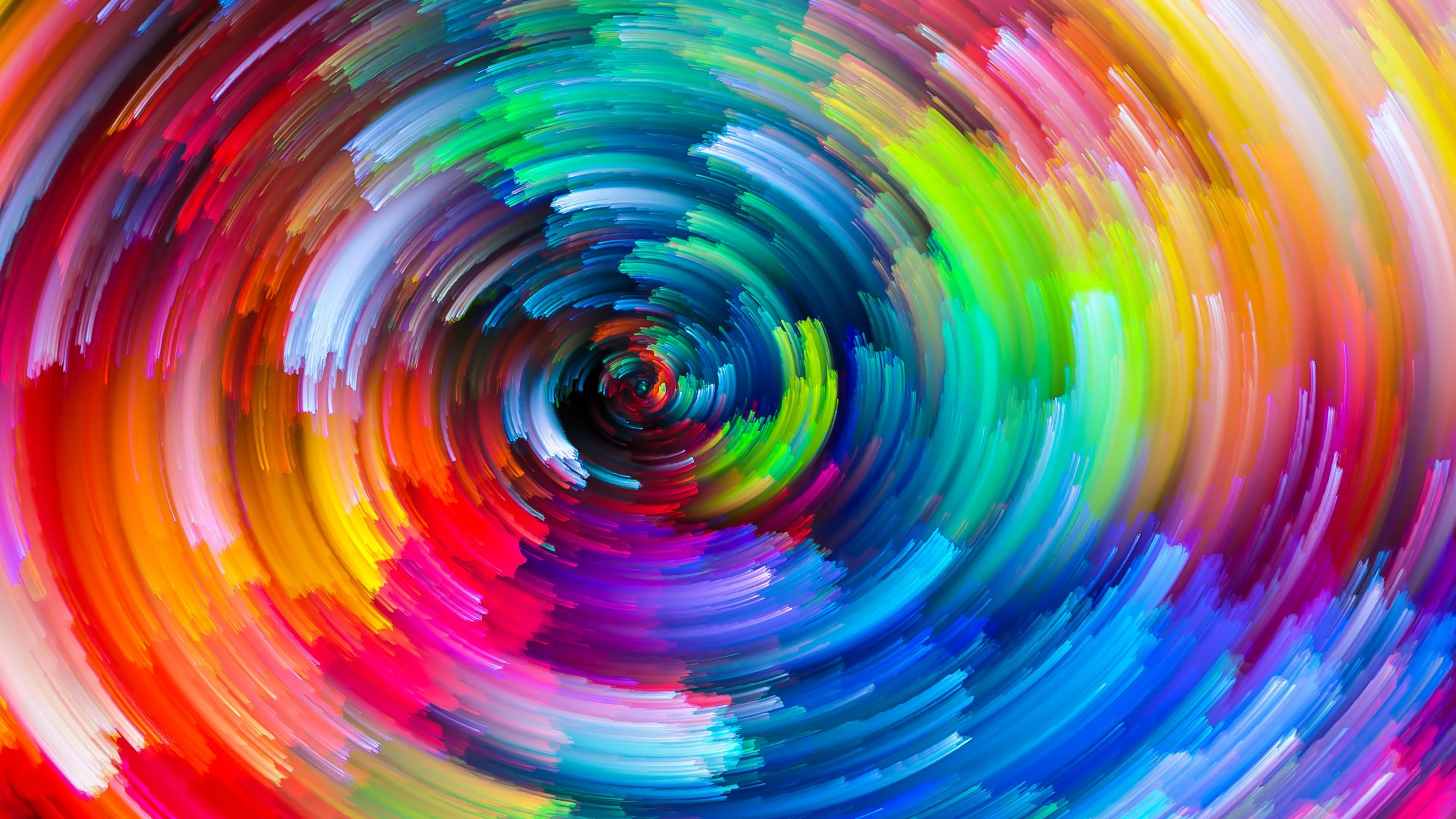 Vivid swirl of rainbow colours in a circular abstract form