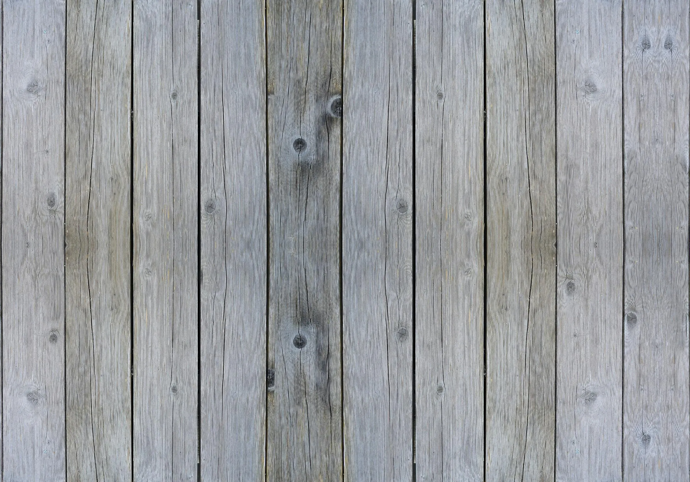 Weathered gray wooden slab with natural texture Wallpaper