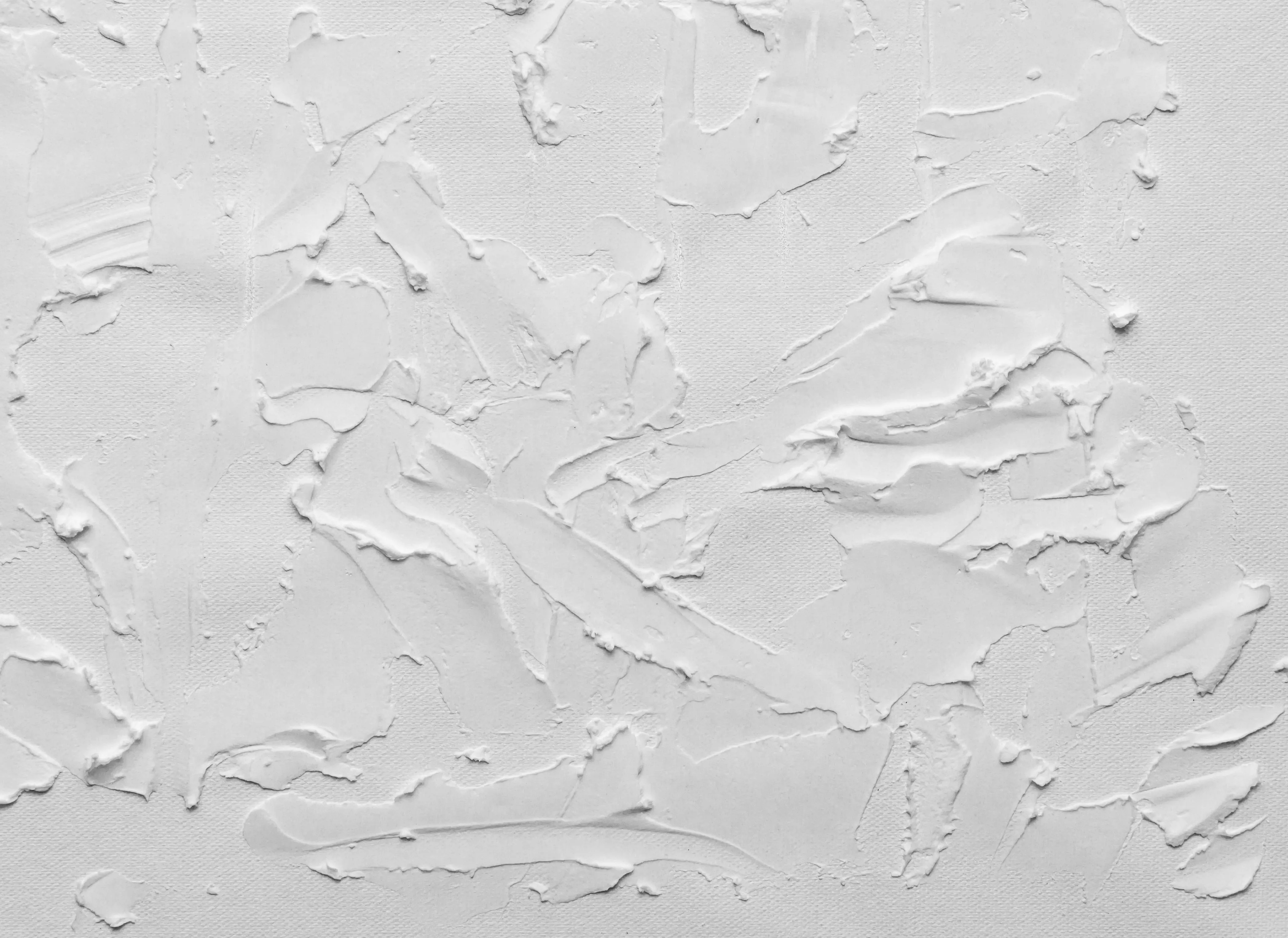 White plaster texture with rough brush strokes Wallpaper