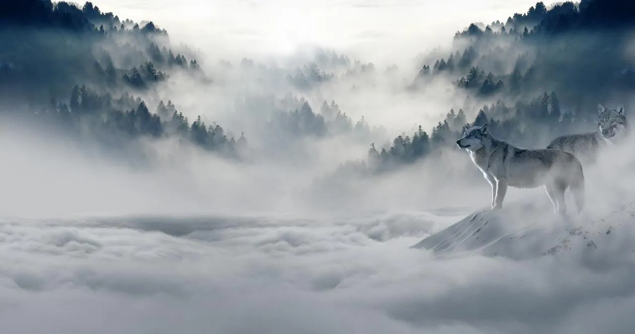 Dramatic Cloudscape over Mountain Range in Mist Wallpaper