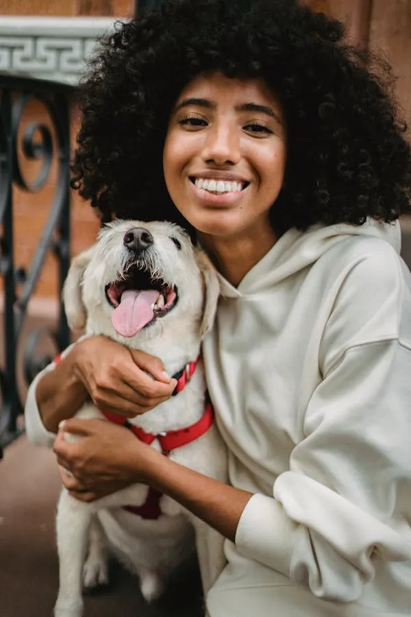 Woman in Casual Outfit Hugging Her Puppy with Smile Hd Image