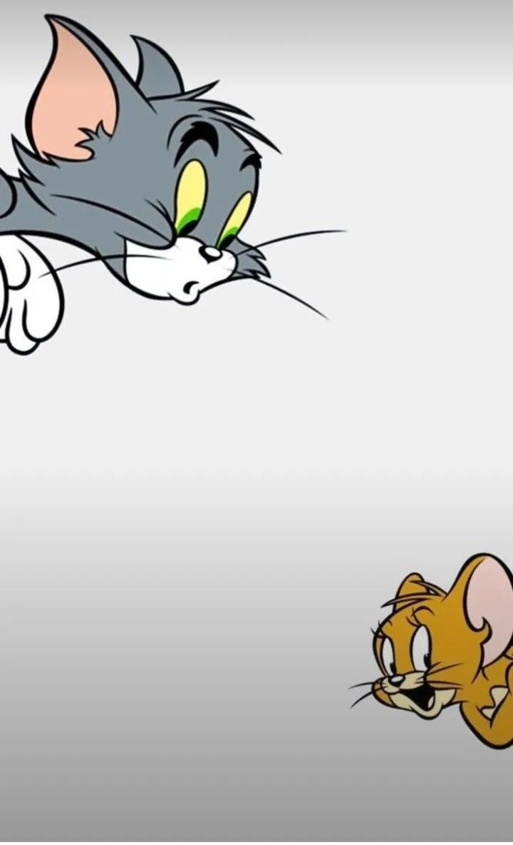 Jerry Riding on Tom in a Fun and Playful Moment wallpaper