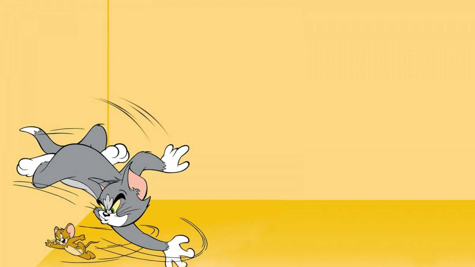 Jerry running away from Tom on a yellow floor wallpaper