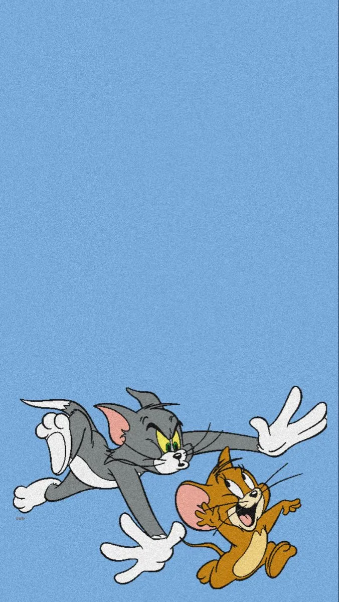 Tom and Jerry Flying Together in a Fun Cartoon Scene