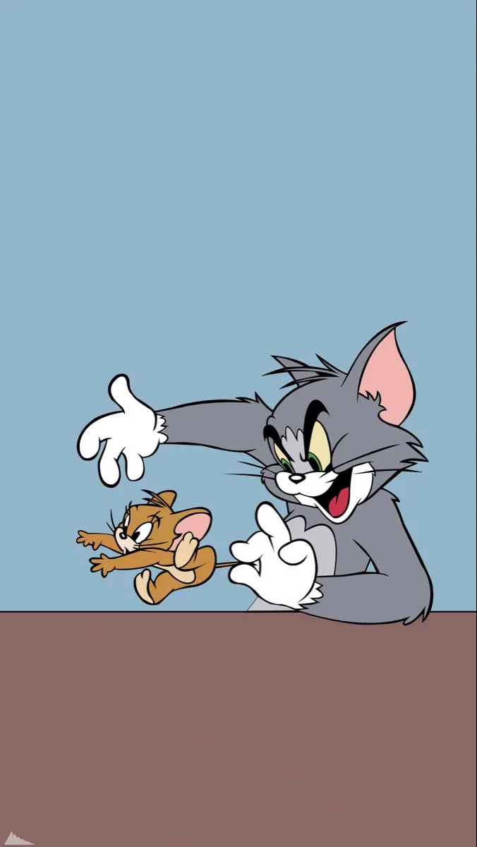 Tom and Jerry looking at something with curiosity wallpaper