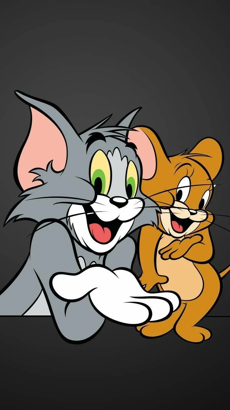 Tom and Jerry Looking Happy and Friendly on a Dark Background