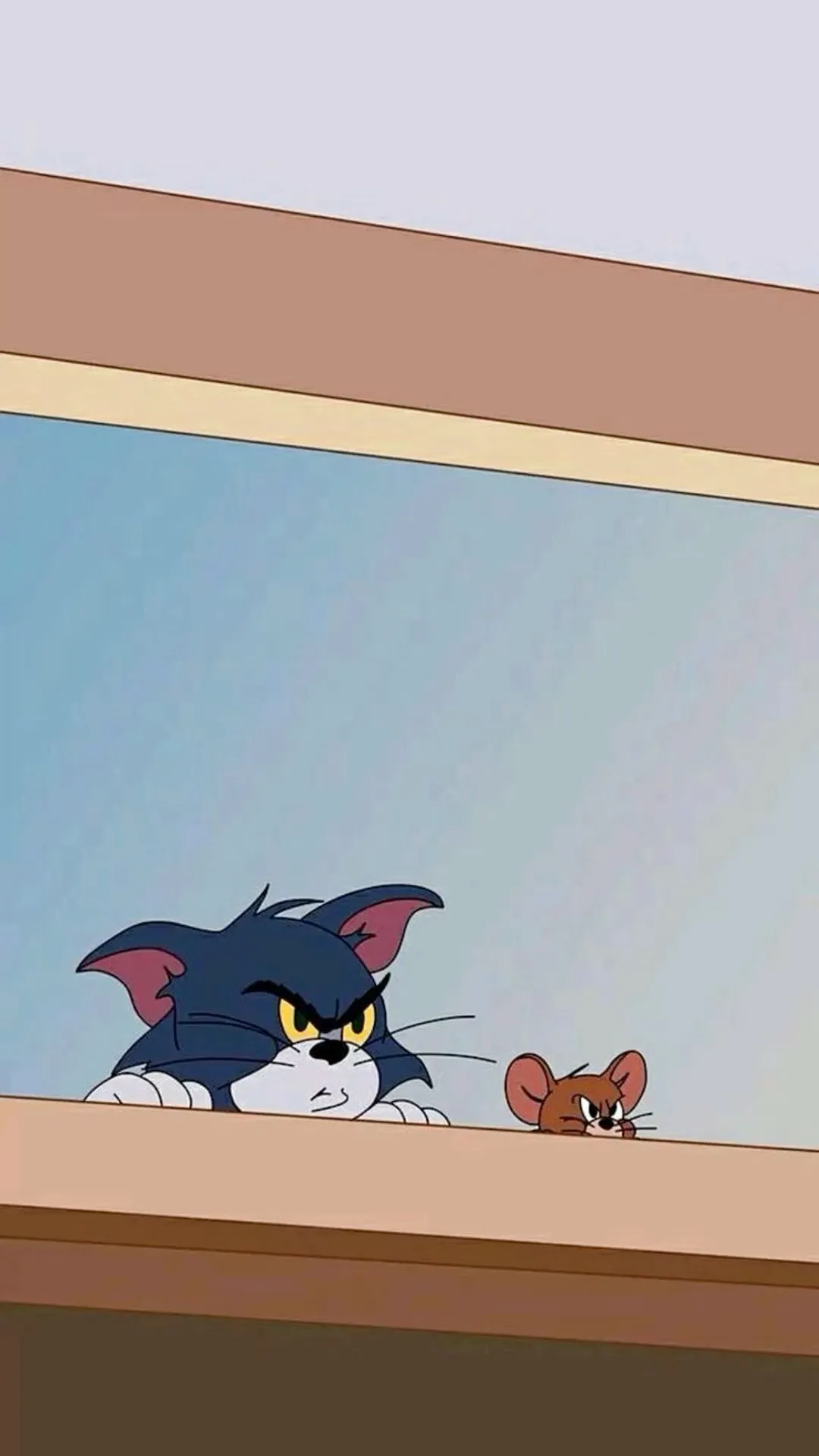 Tom and Jerry Playing on a Wooden Surface in Cartoon Scene