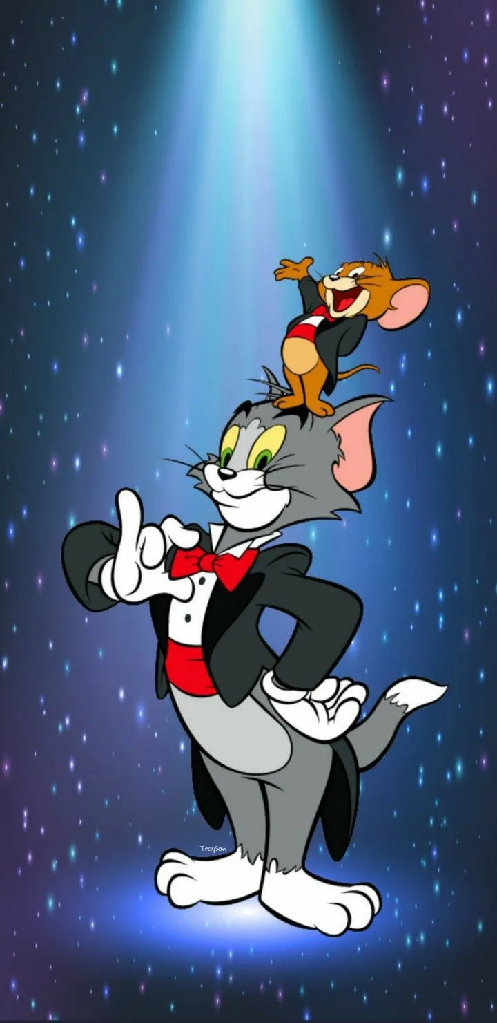 Tom and Jerry Playing Under Starry Night in Fun Cartoon Scene