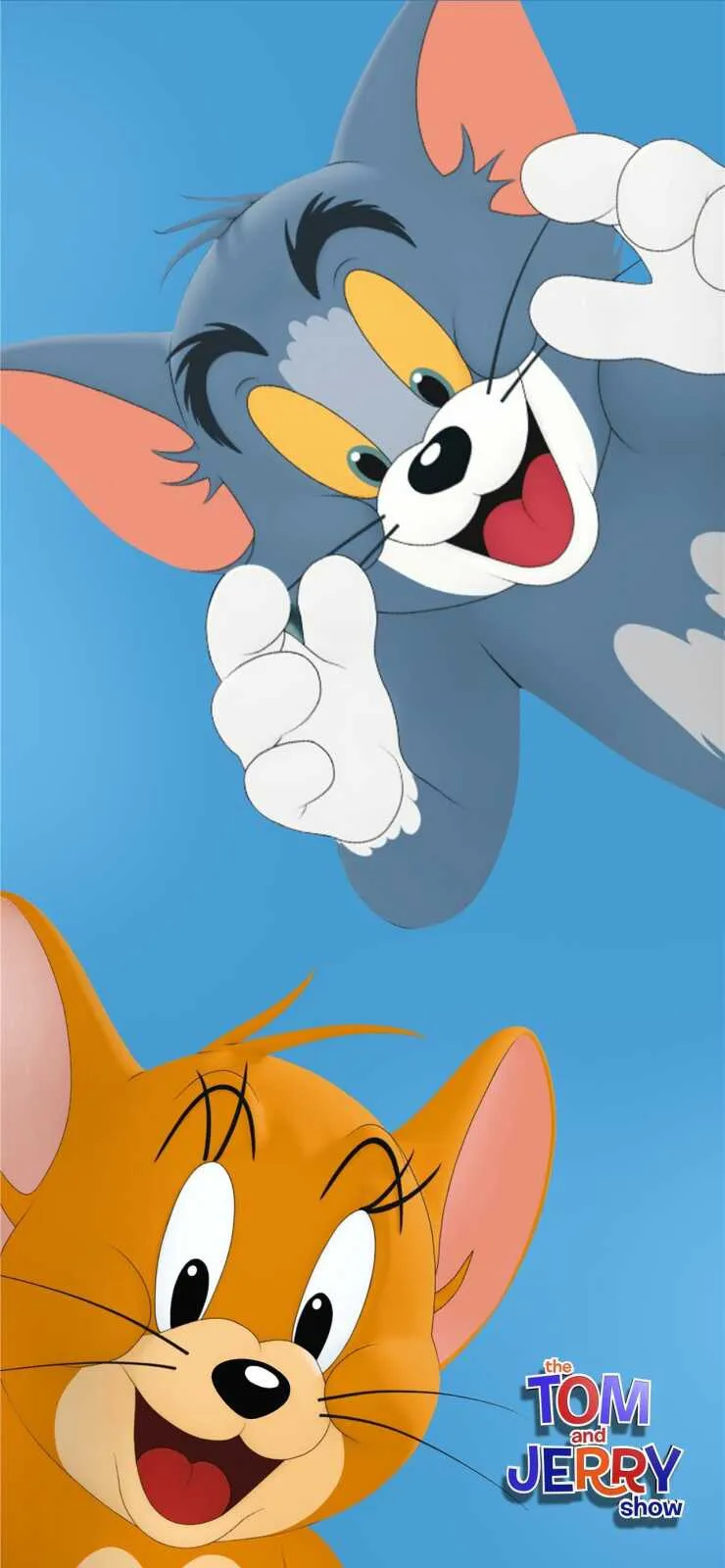 Tom and Jerry smiling together with bright blue backdrop