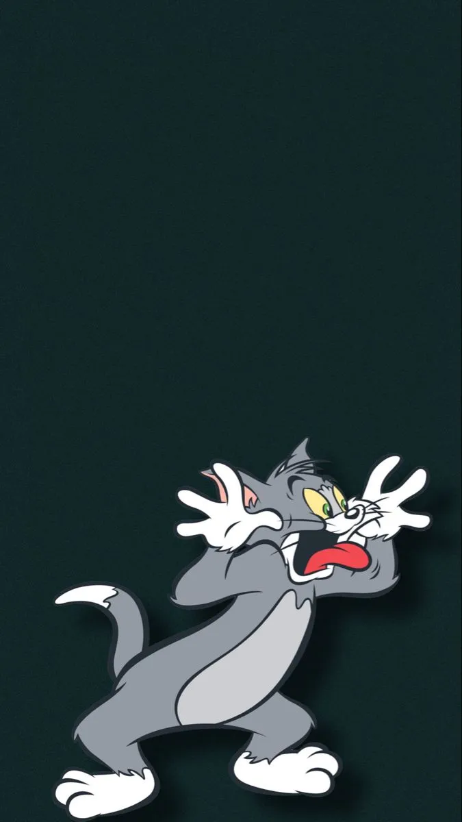 Tom sneaking up slowly with Jerry watching nearby wallpaper